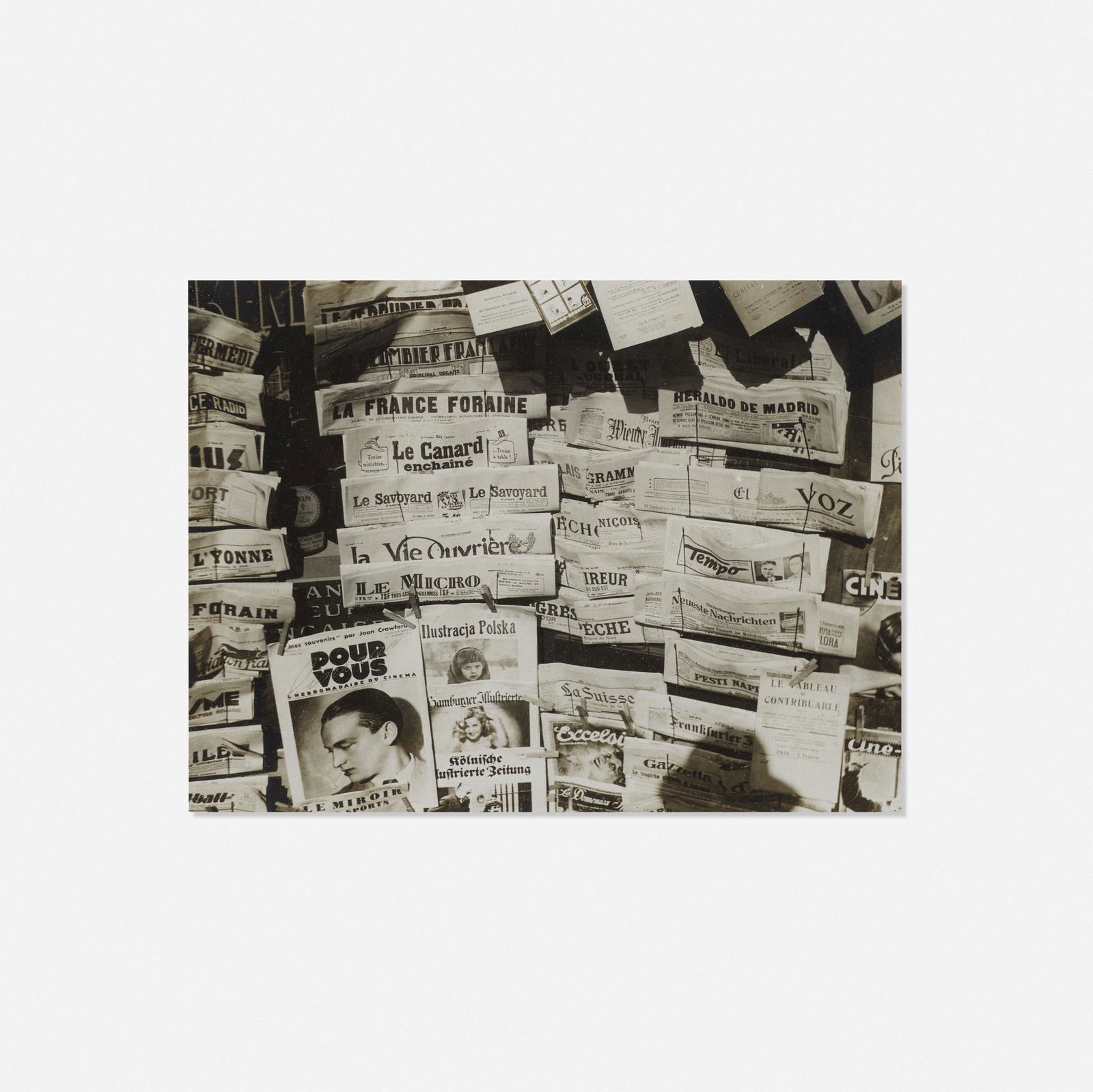 Claude Tolmer, Untitled (Newsstand): Claude Tolmer Untitled (Newsstand) 1933gelatin silver print5.75 h × 7.5 w in (15 × 19 cm) Signed and dated to verso 'Claude Tolmer 1933'. Provenance: Keith de