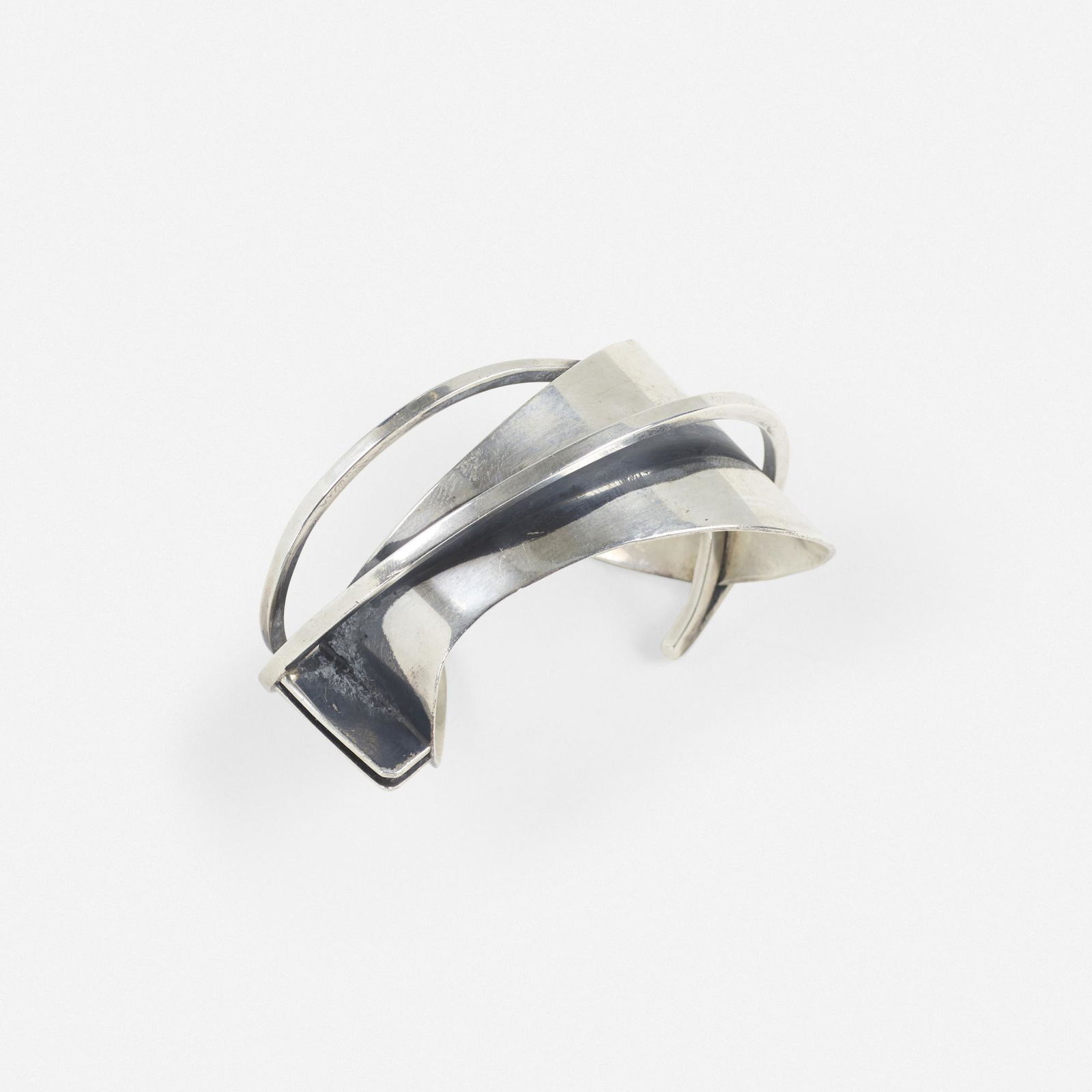 Ed Wiener, bracelet: Ed Wiener bracelet USA, c. 1950sterling silver1.5 h × 2.75 w × 2.25 d in (4 × 7 × 6 cm) Interior measures: 1.5 l x 2 w inches. Impressed signature to edge 'Ed Wiener S
