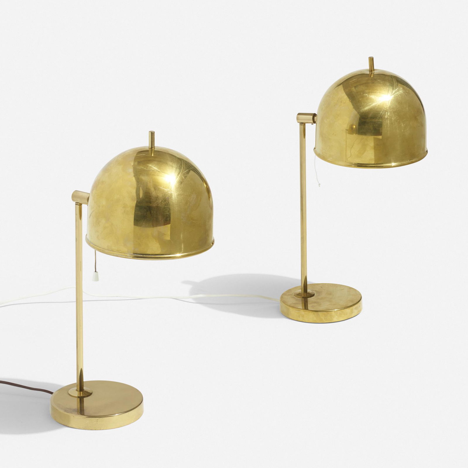 Bergboms, table lamps, pair: Bergboms table lamps, pair Sweden, c. 1950brass8 w × 11.5 d × 20 h in (20 × 29 × 51 cm) Cast manufacturer's mark to underside of base of each example 'Bergboms B-075'.