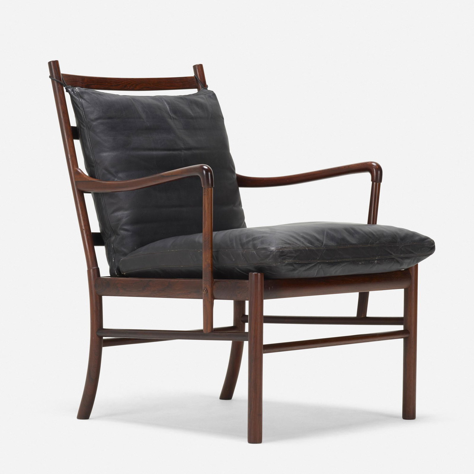 Ole Wanscher, Colonial armchair: Ole Wanscher Colonial armchair Poul Jeppesen Denmark, 1949 rosewood, leather, rattan 25 w × 24 d × 33 h in (63 × 61 × 84 cm) Metal tag manufacturer's mark to underside
