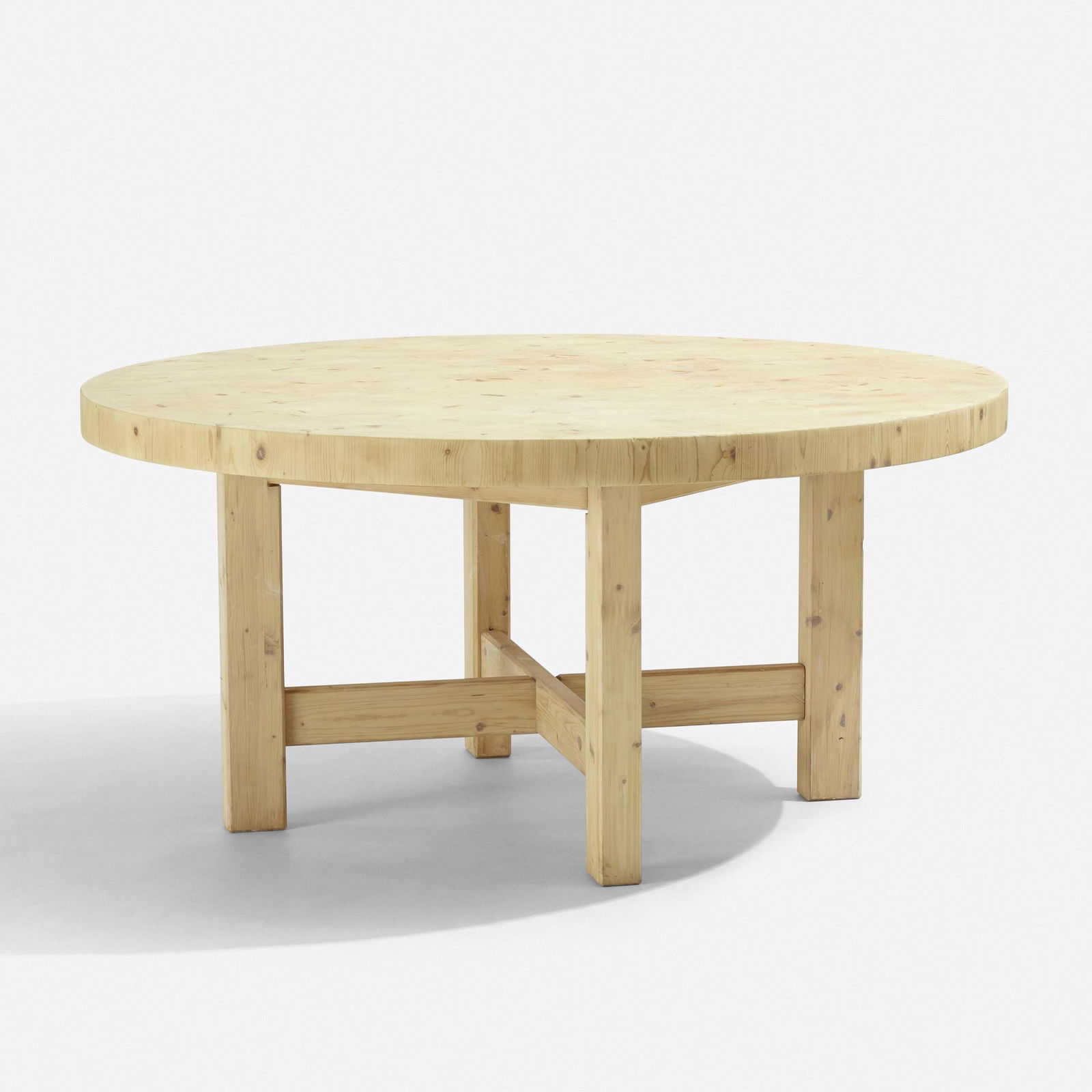 Roland Wilhelmsson, dining table: Roland Wilhelmsson dining table Karl Andersson & SonerSweden, c. 1970pine59 dia × 28.25 h in (150 × 72 cm)