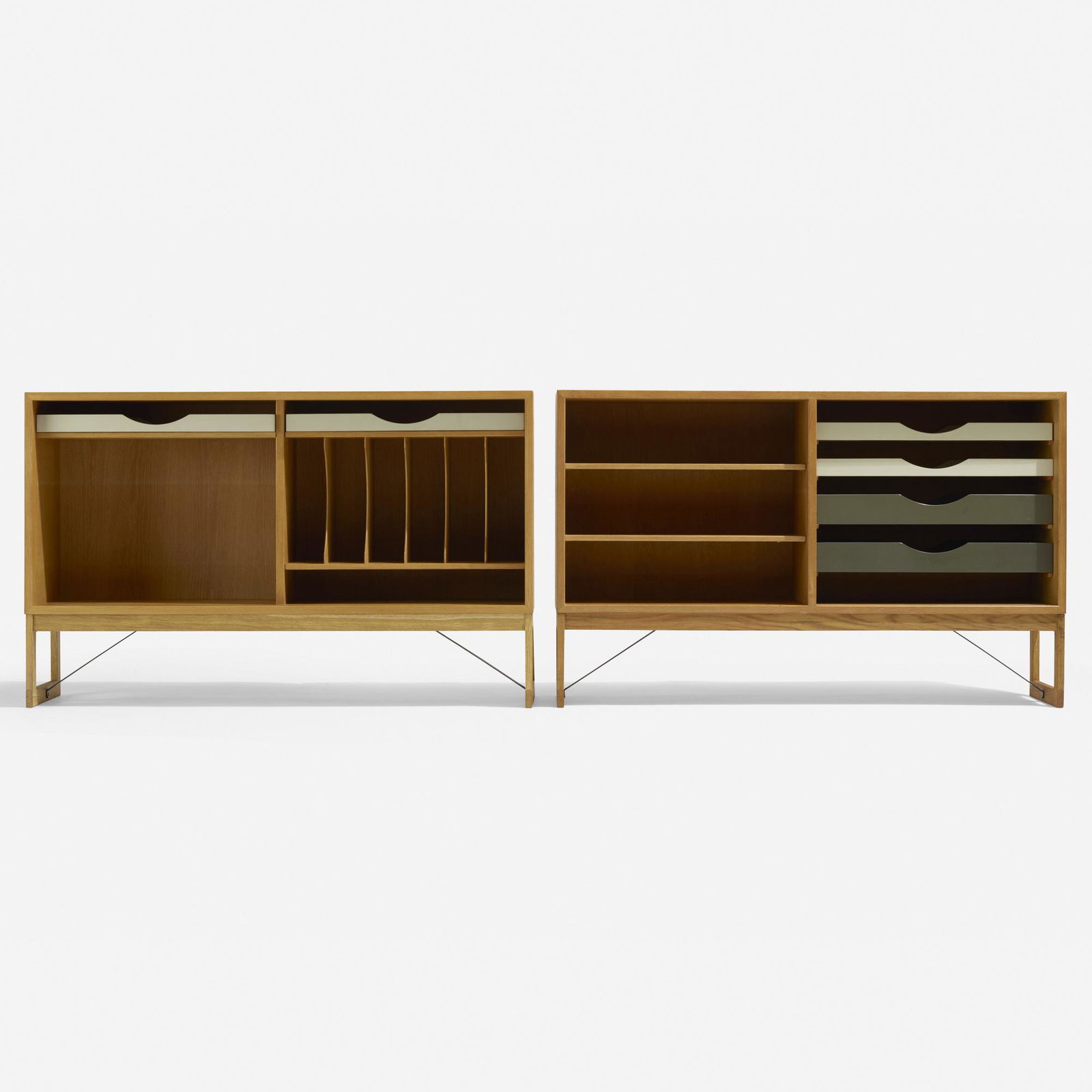 Borge Mogensen, cabinets, pair: Borge Mogensen cabinets, pair Karl Andersson & SonerDenmark / Sweden, c. 1955oak, lacquered wood, brass53 w × 14 d × 33 h in (135 × 36 × 84 cm) Made in Sweden'.One c