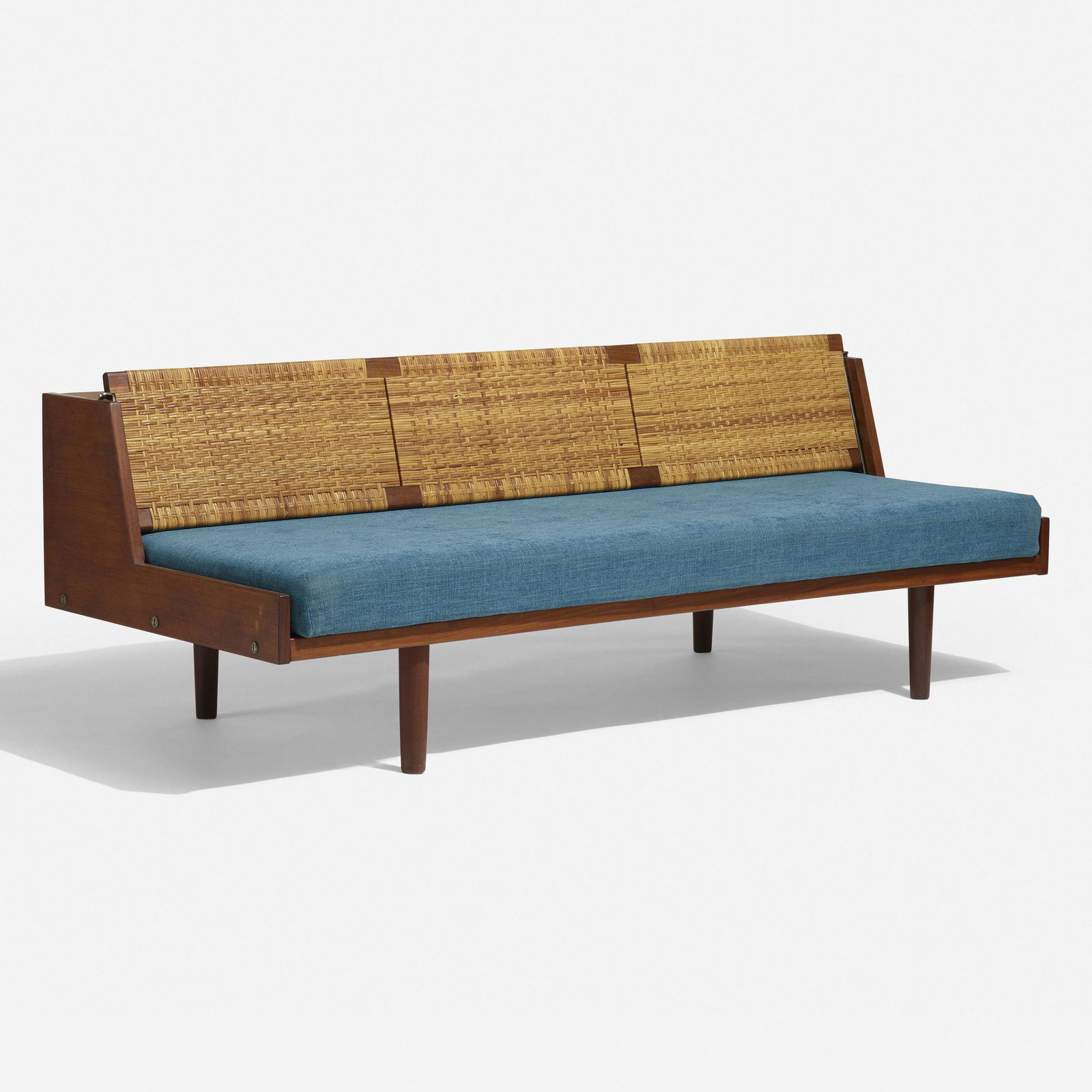 Hans J. Wegner, daybed, model GE6: Hans J. Wegner daybed, model GE6 GetamaDenmark, c. 1965teak, upholstery, cane78 w × 35 d × 28.75 h in (198 × 89 × 73 cm) This daybed features a backrest that can be