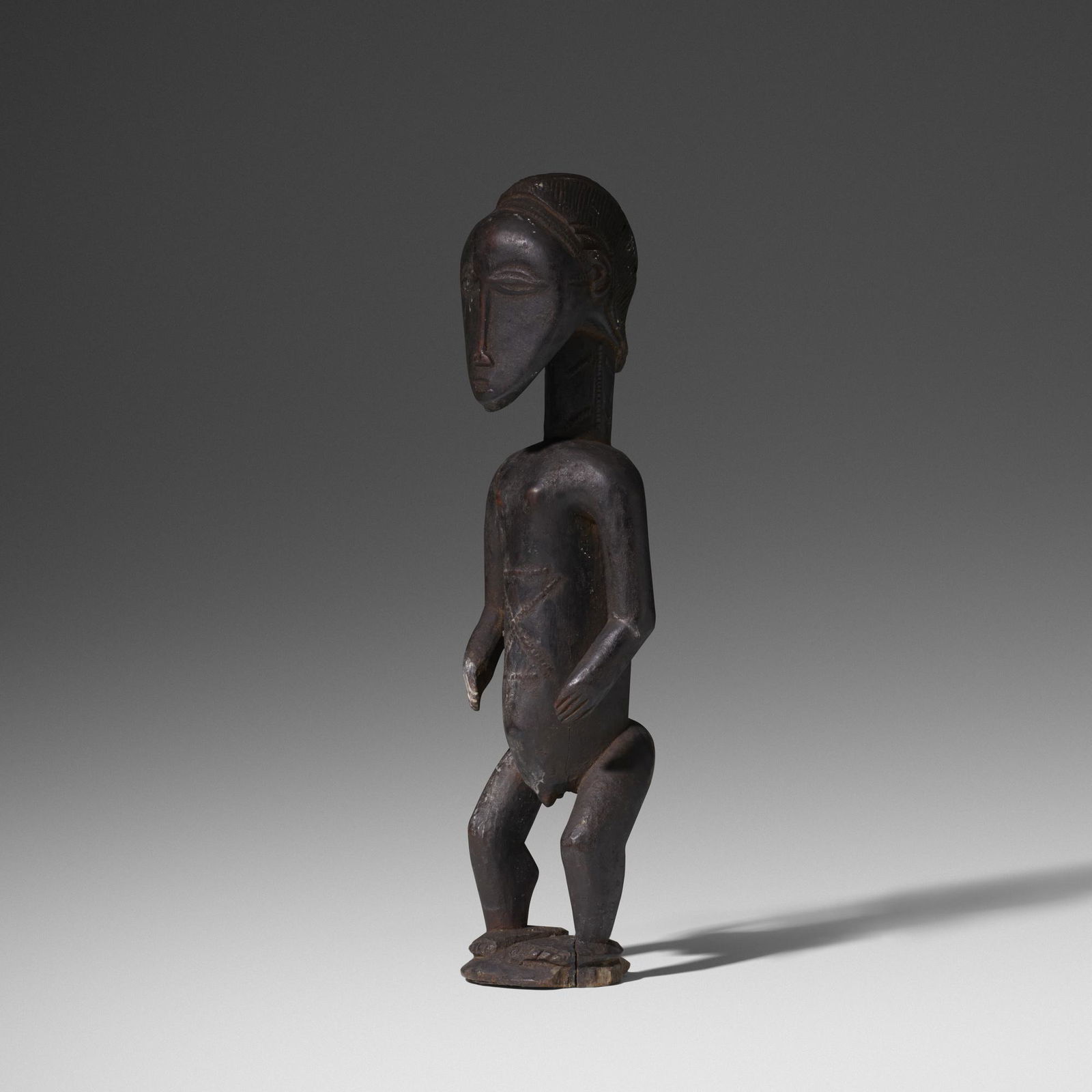 Baule artist, Asie usu (bush spirit) figure: Baule artist Asie usu (bush spirit) figure Cote d'Ivoire, 20th Centurycarved wood3.5 dia × 13 h in (9 × 33 cm) Provenance: Mr. and Mrs. Alvin S. Novak | The Saint Lou