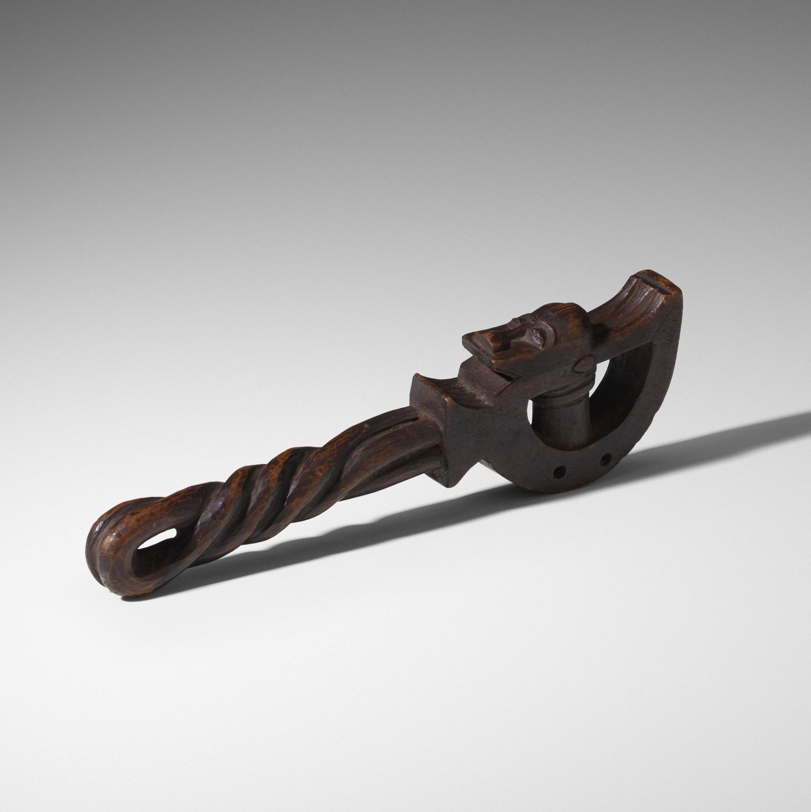 Baule artist, Iowre (gong beater): Baule artist Iowre (gong beater) Cote d'Ivoire, 20th century carved wood 3 w × 1 d × 10 h in (8 × 3 × 25 cm) Provenance: Collection of Mark Isaacson and Gre