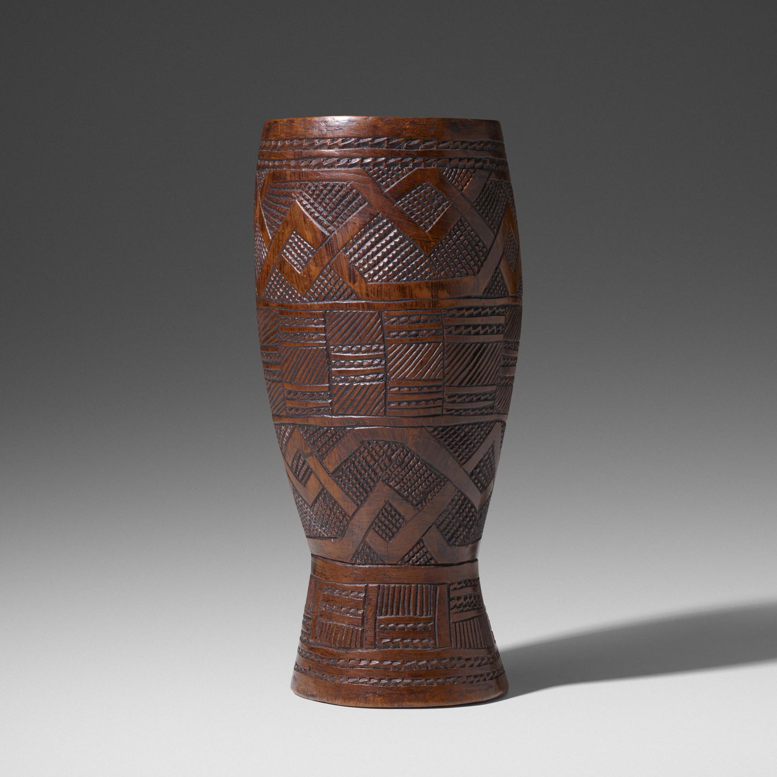 Kuba artist, vessel: Kuba artist vessel Democratic Republic of the Congo, 20th centurycarved wood5 dia × 10.25 h in (13 × 26 cm) Provenance: Collection of Mark Isaacson and Greg Nacozy