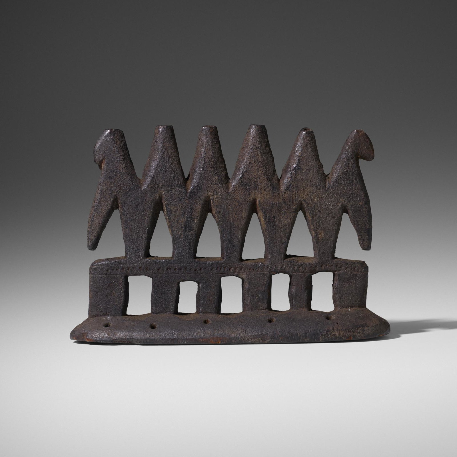 Bamana artist, headcrest: Bamana artist headcrest Mali, 20th century carved wood 8.5 w × 2.25 d × 5.5 h in (22 × 6 × 14 cm) Provenance: Collection of Mark Isaacson and Greg Nacozy