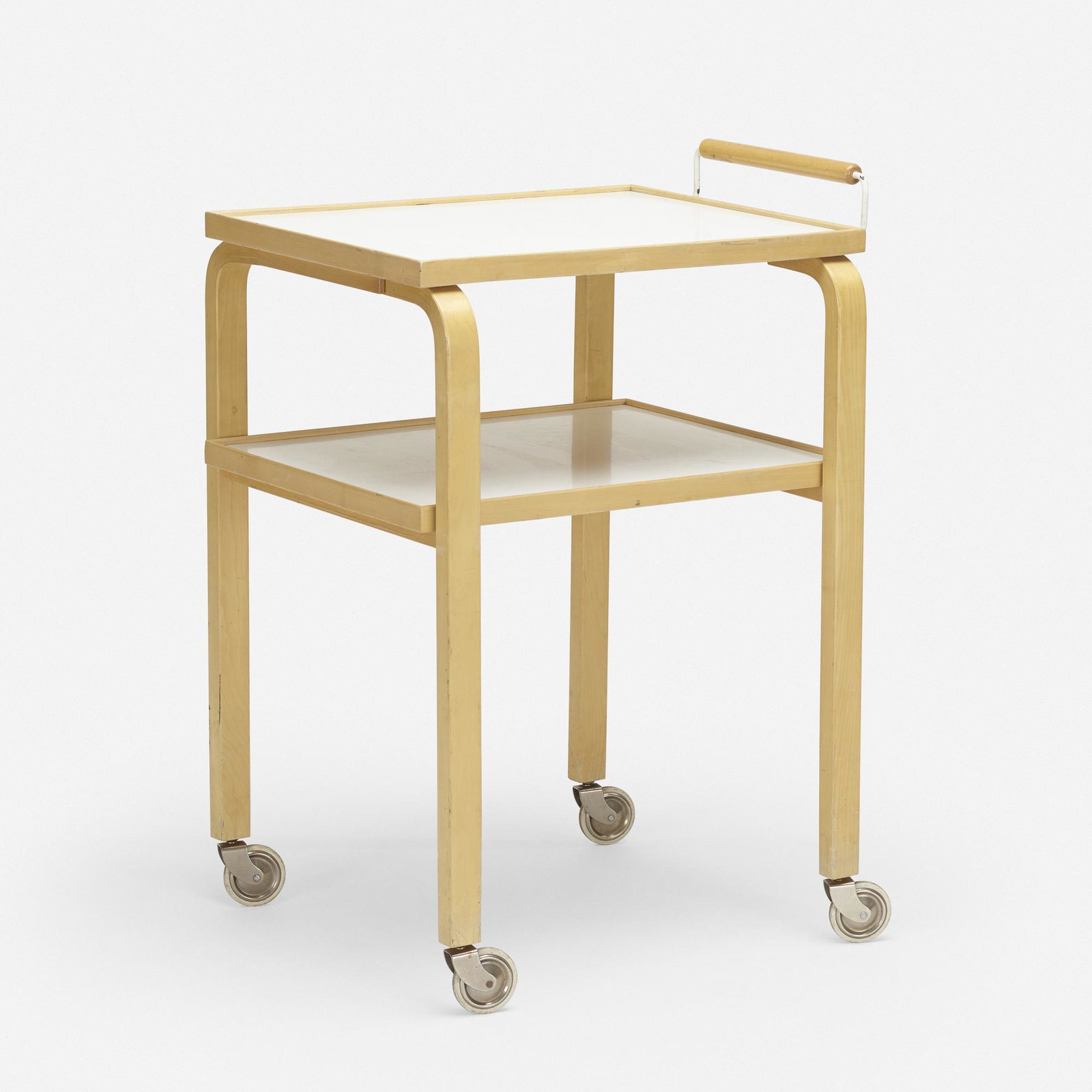 In the manner of Alvar Aalto, tea cart: In the manner of Alvar Aalto tea cart c. 1970 laminated beech, laminate, enameled steel, rubber 35.25 h × 20.5 w × 26 d in (90 × 52 × 66 cm)