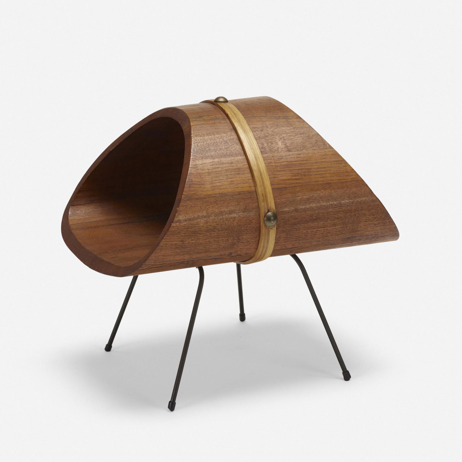In the manner of Carl Aubock, magazine rack: In the manner of Carl Aubock magazine rack c. 1950teak, enameled steel, bamboo, brass16 h × 17.25 w × 13 d in (41 × 44 × 33 cm)