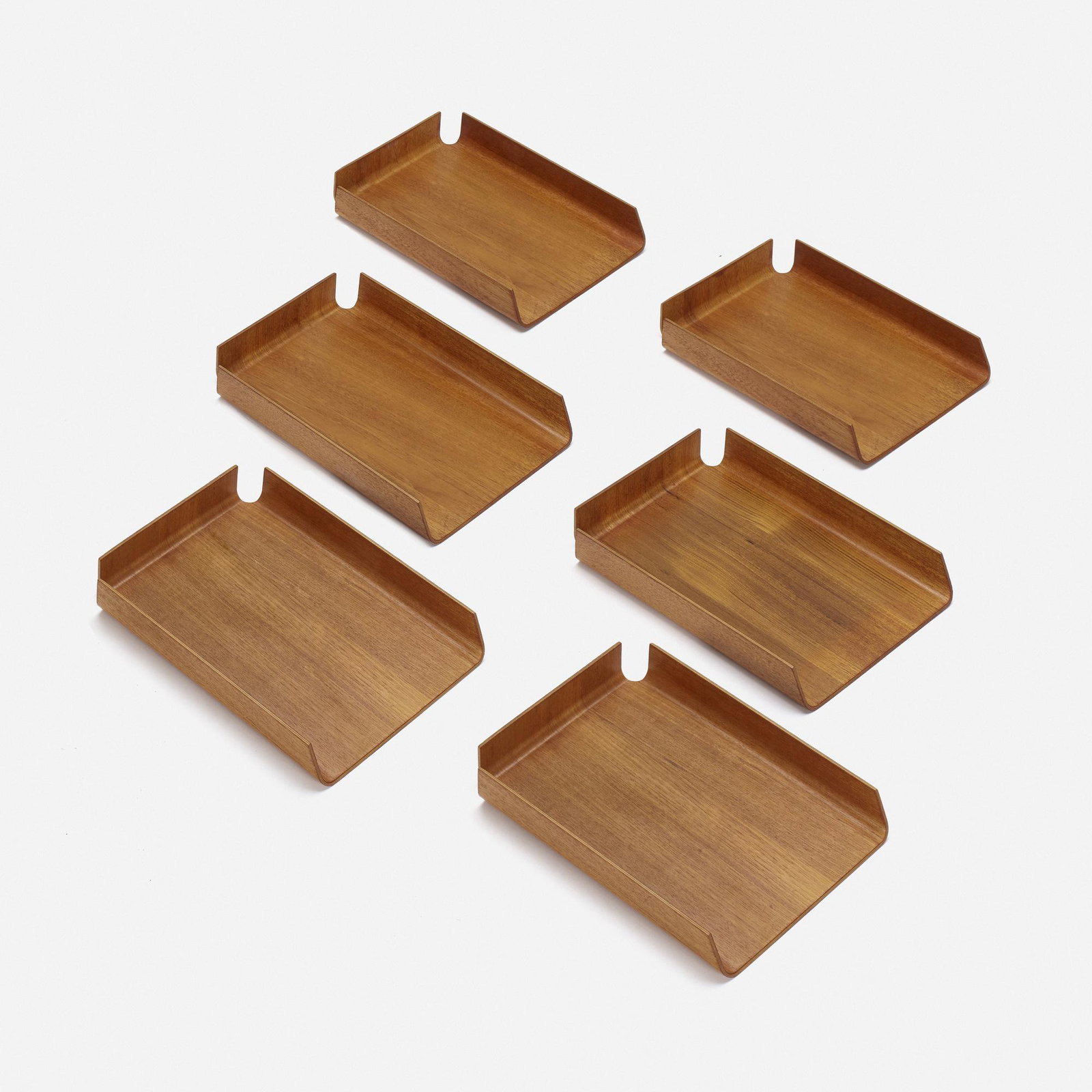 Mallod, letter trays, set of six: Mallod letter trays, set of six United Kingdom, c.1960 molded teak plywood 14 w × 10 d × 2 h in (36 × 25 × 5 cm) Decal manufacturer's label to underside of three examples 'M
