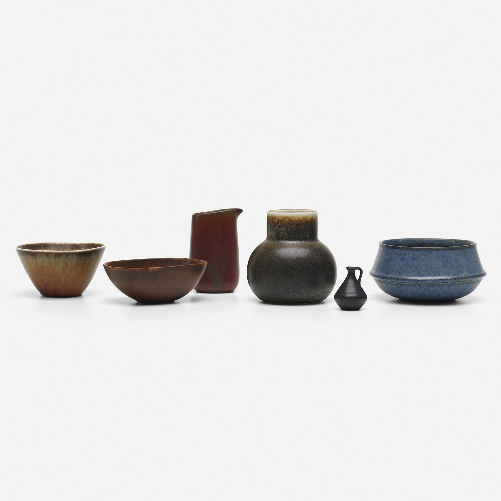 Carl-Harry Stalhane, collection of six vessels: Carl-Harry Stalhane collection of six vessels RorstrandSweden, c. 1950glazed stoneware5.5 dia × 2.5 h in (14 × 6 cm) Incised manufacturer's mark to underside of each example 'R