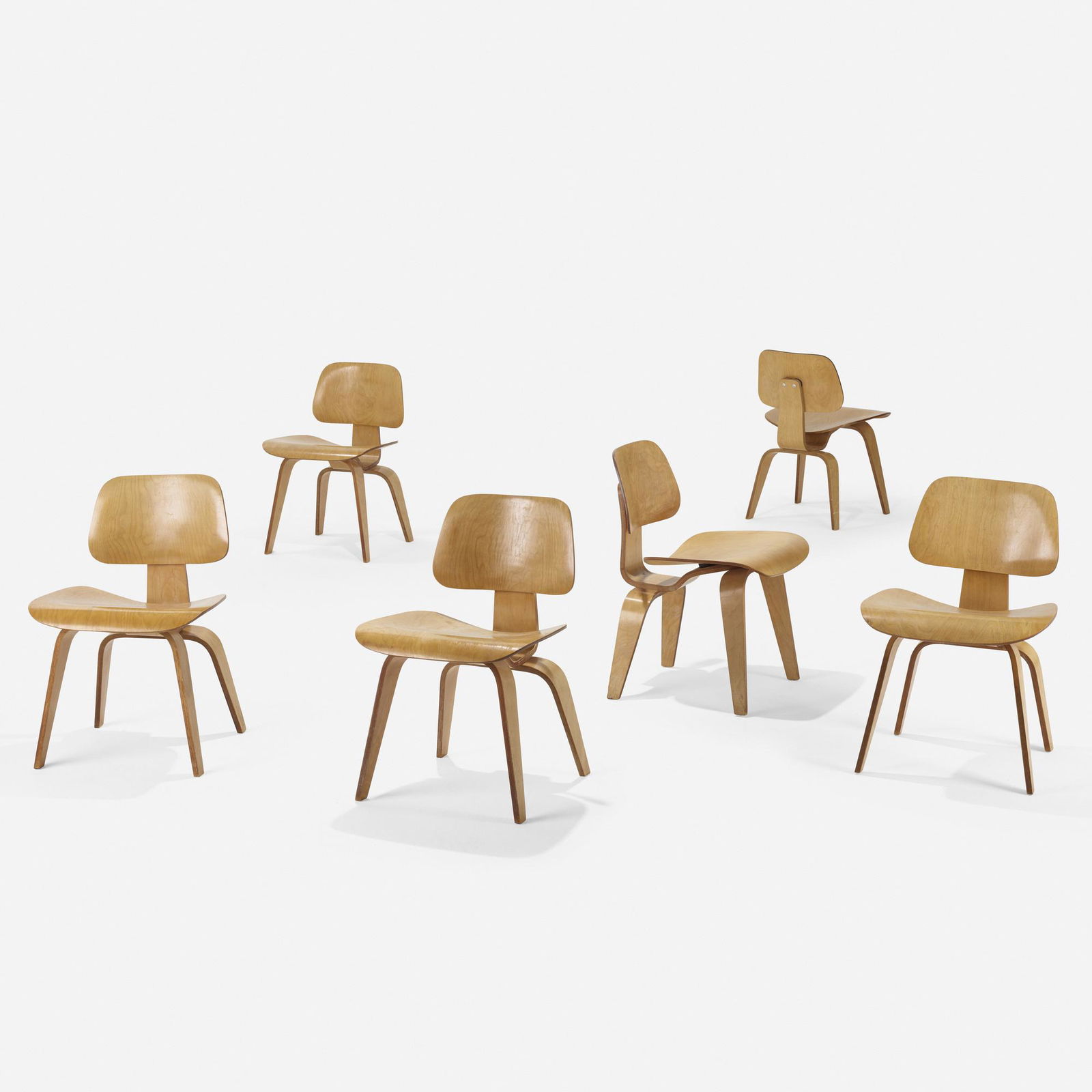 Charles and Ray Eames, DCWs, set of six: Charles and Ray Eames DCWs, set of six Evans Products/Herman MillerUSA, 1945 / c. 1950molded ash plywood, rubber19.25 w × 22 d × 29 h in (49 × 56 × 74 cm) Partial ma