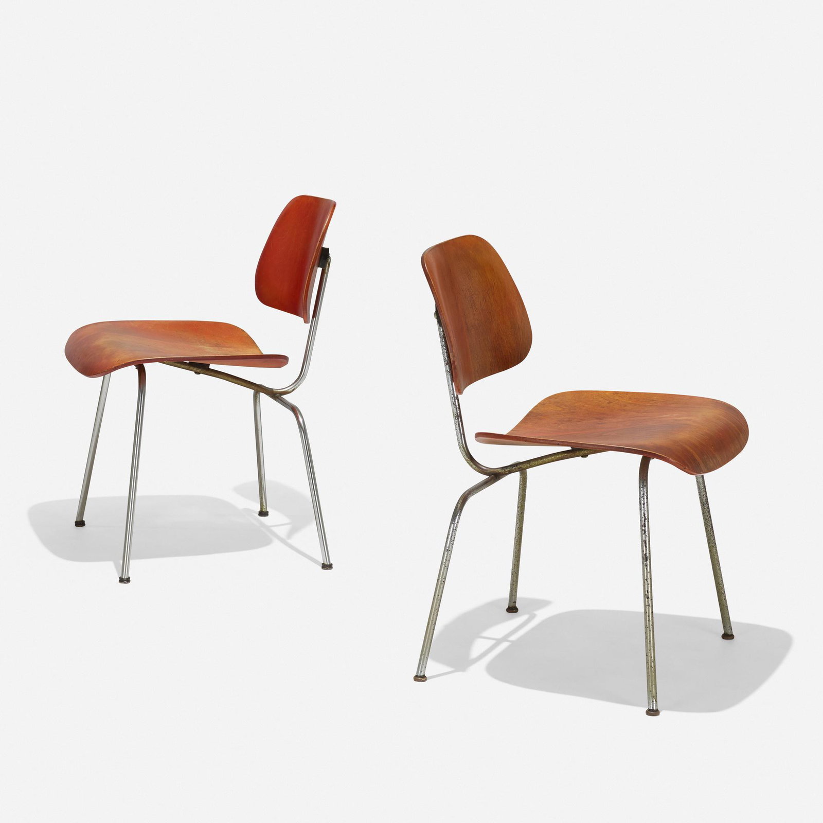 Charles and Ray Eames, DCMs, pair: Charles and Ray Eames DCMs, pair Herman Miller USA, 1946 / c. 1953 aniline-dyed birch plywood, chrome-plated steel, rubber 19.5 w × 22 d × 29 h in (50 × 56 × 74 cm)