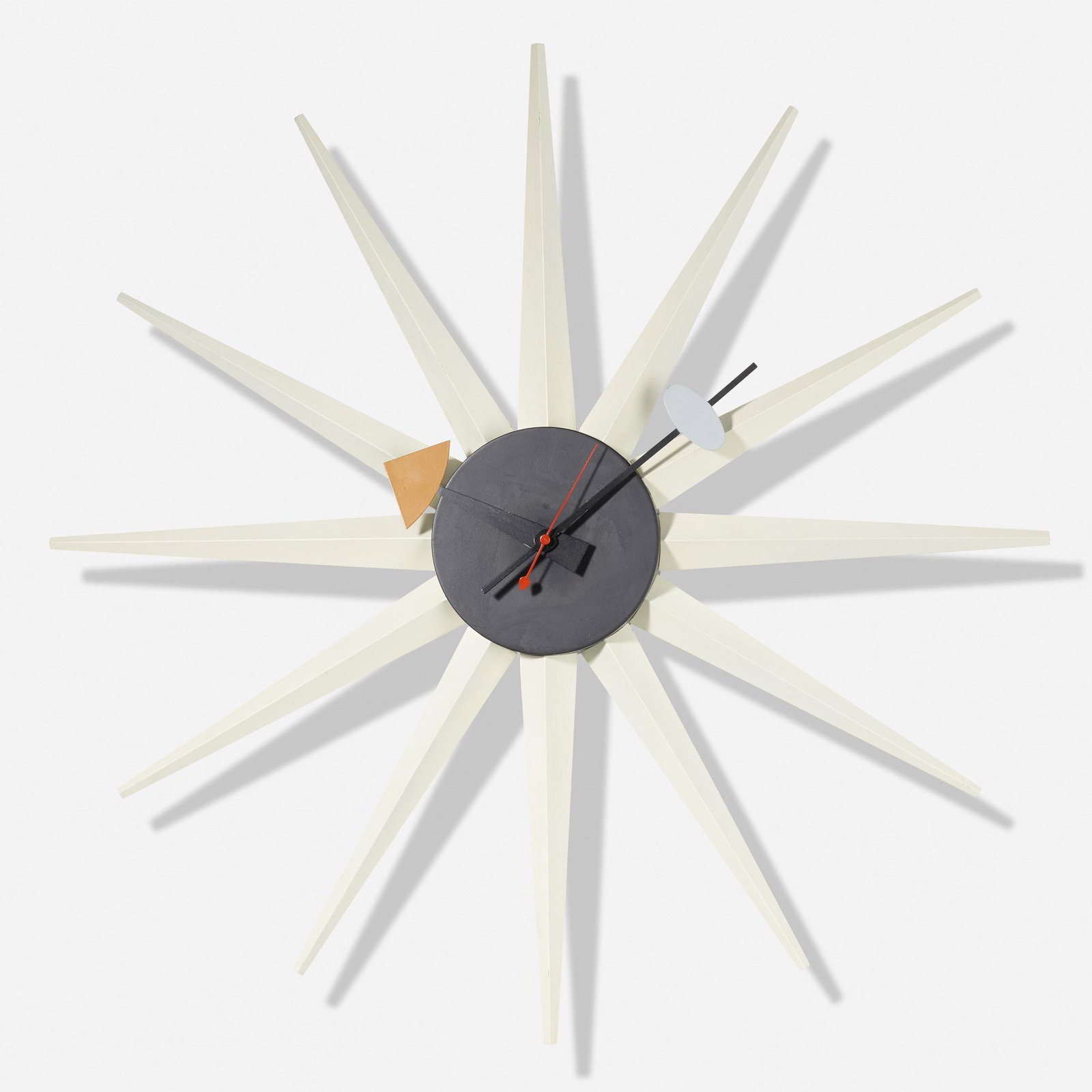 George Nelson & Associates, Spike wall clock: George Nelson & Associates Spike wall clock, model 2202C Howard Miller Clock Company USA, 1952-53 lacquered wood, enameled brass and aluminum 18.5 dia × 3 d in (47 × 8 cm) Incised