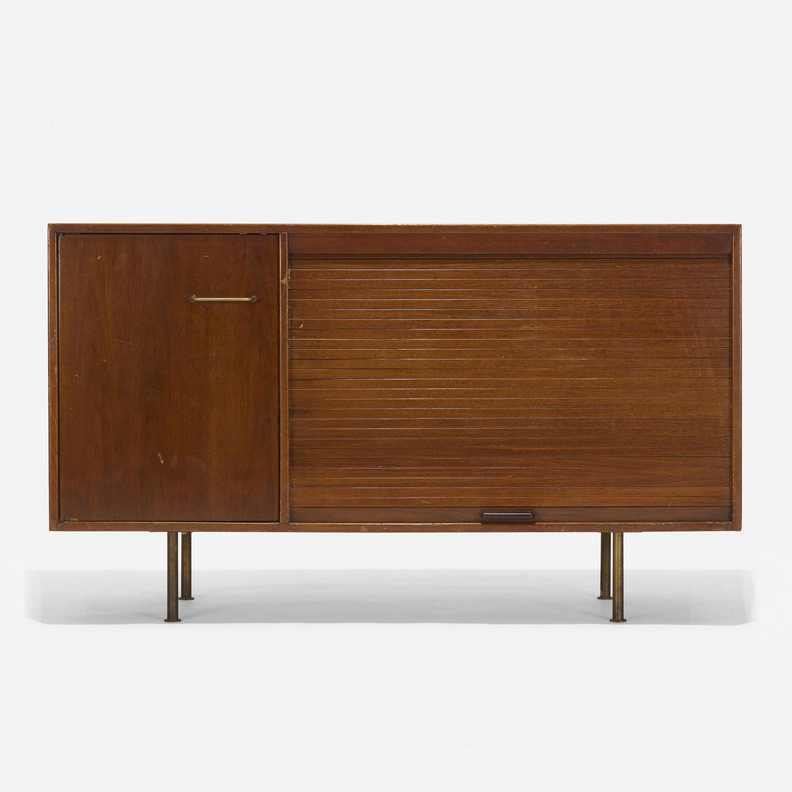 Jens Risom, cabinet, model R-11: Jens Risom cabinet, model R-11 Jens Risom Design Inc.USA, c. 1955walnut, mahogany, brass54 w × 22.25 d × 31.5 h in (137 × 57 × 80 cm) Cabinet features one door conce