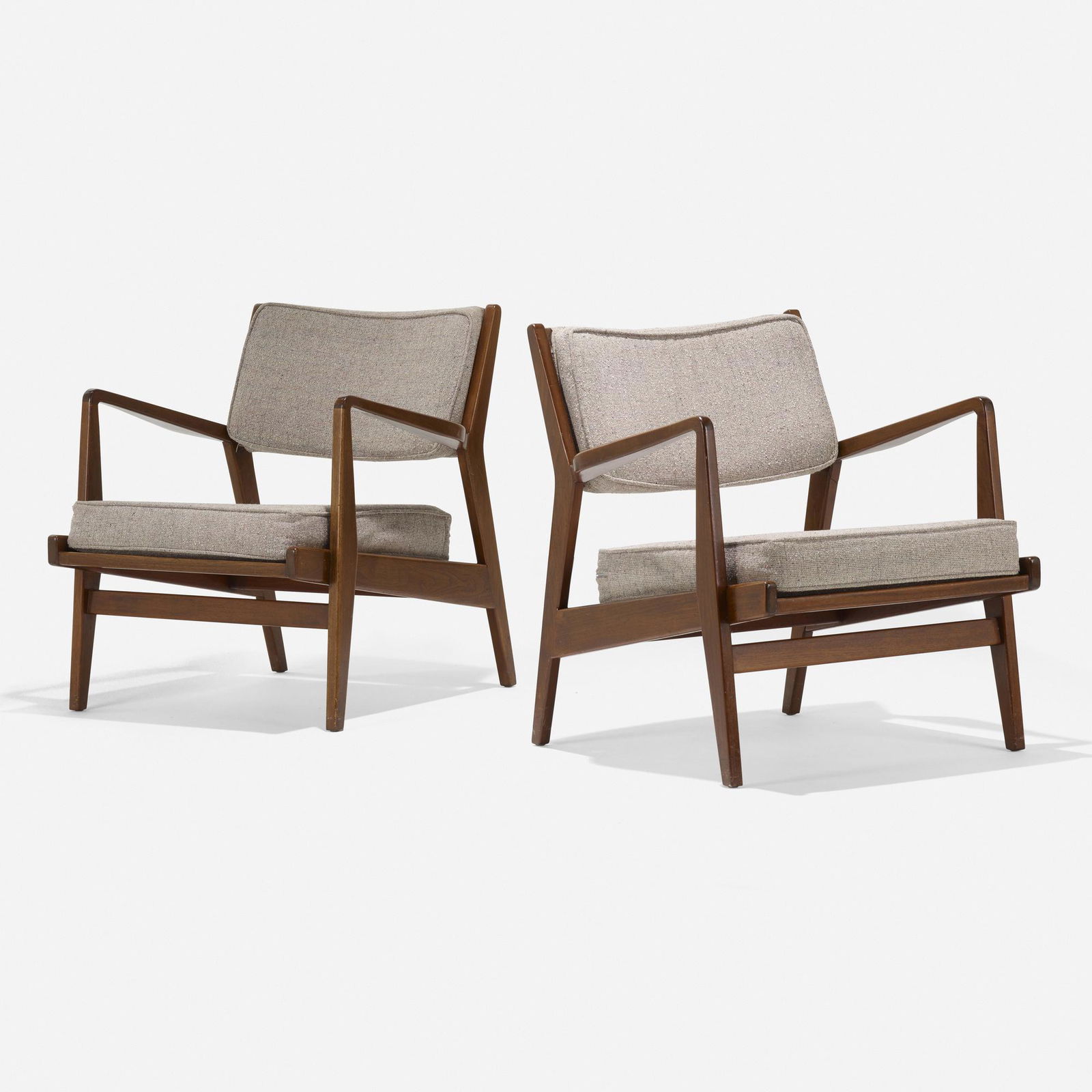 Jens Risom, lounge chairs model U-430, pair: Jens Risom lounge chairs model U-430, pair Jens Risom Design Inc.USA, c. 1955walnut, upholstery27 w × 25 d × 29 h in (69 × 63 × 74 cm) Fabric manufacturer's label to