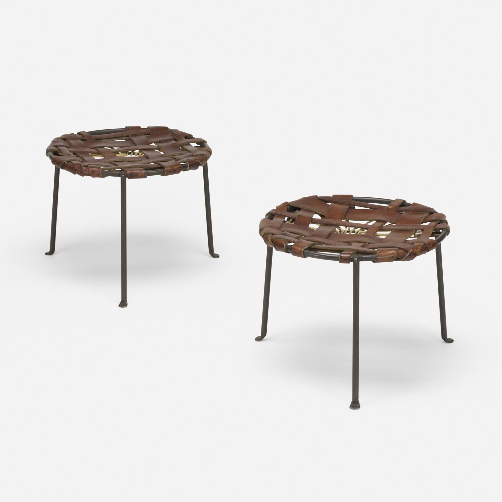 Lila Swift and Donald Monell, stools, pair: Lila Swift and Donald Monell stools, pair USA, c. 1955 wrought iron, leather, cotton rope 12 h × 16 dia in (30 × 41 cm) Stamped manufacturer's mark to underside of each example 'Swift &