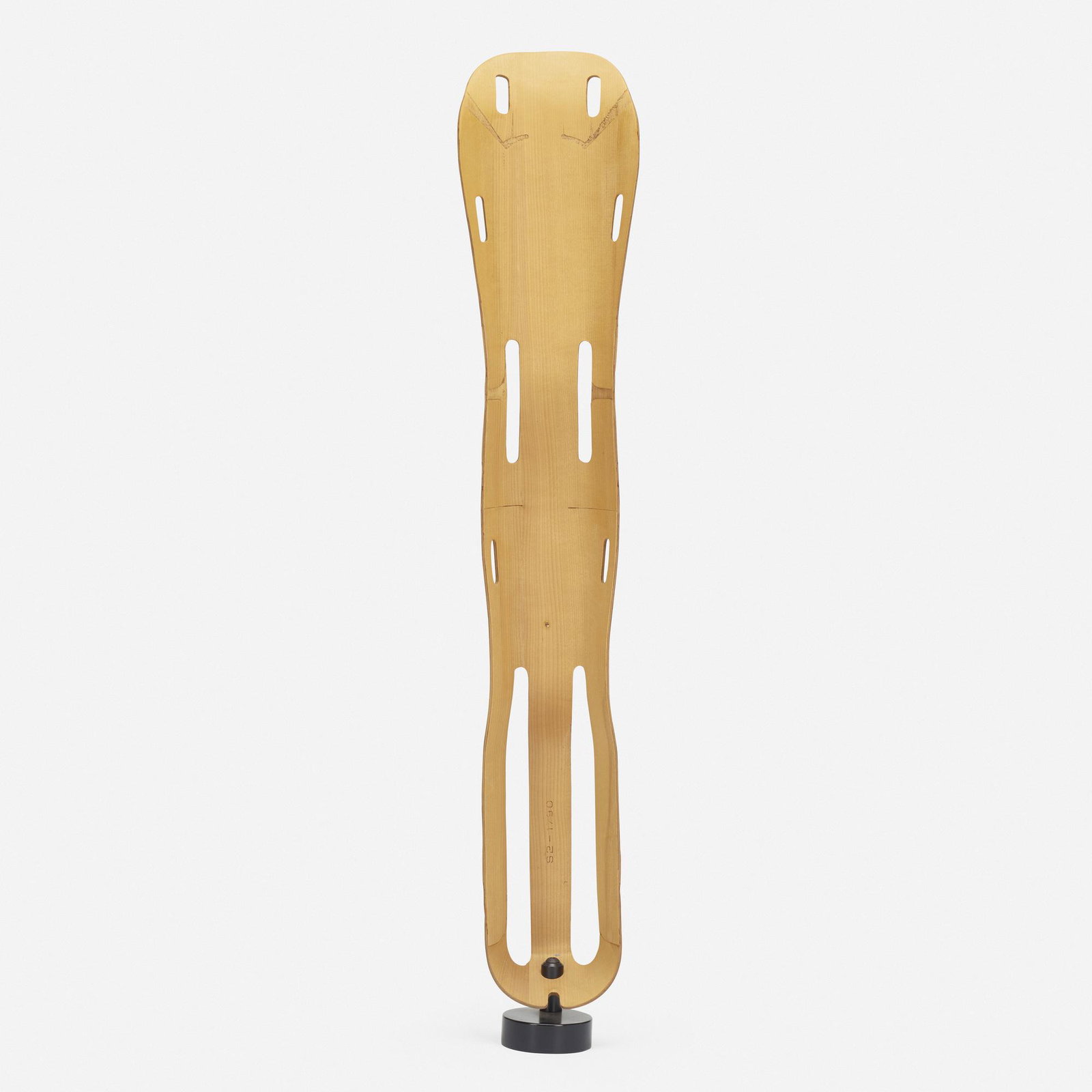 Charles and Ray Eames, leg splint: Charles and Ray Eames leg splint Evans Products USA, 1943 molded mahogany plywood 42 h × 8 w × 4 d in (107 × 20 × 10 cm) Stamped manufacturer's mark to edge 'Evans Prod