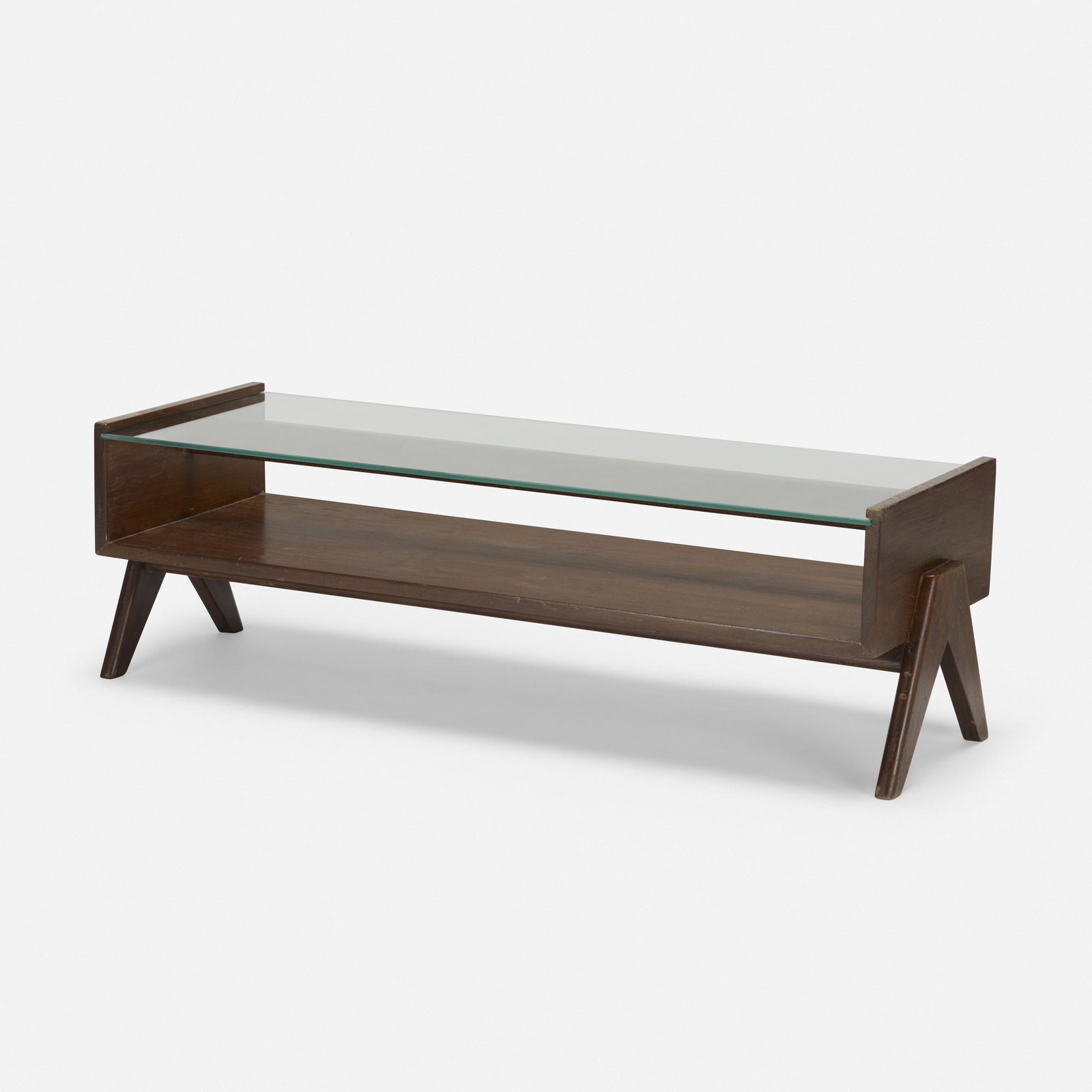 Pierre Jeanneret, coffee table from Chandigarh: Pierre Jeanneret coffee table from Chandigarh France/India, c. 1960 teak, glass 51 w × 17.75 d × 16 h in (130 × 45 × 41 cm) Provenance: Chandigarh, India |