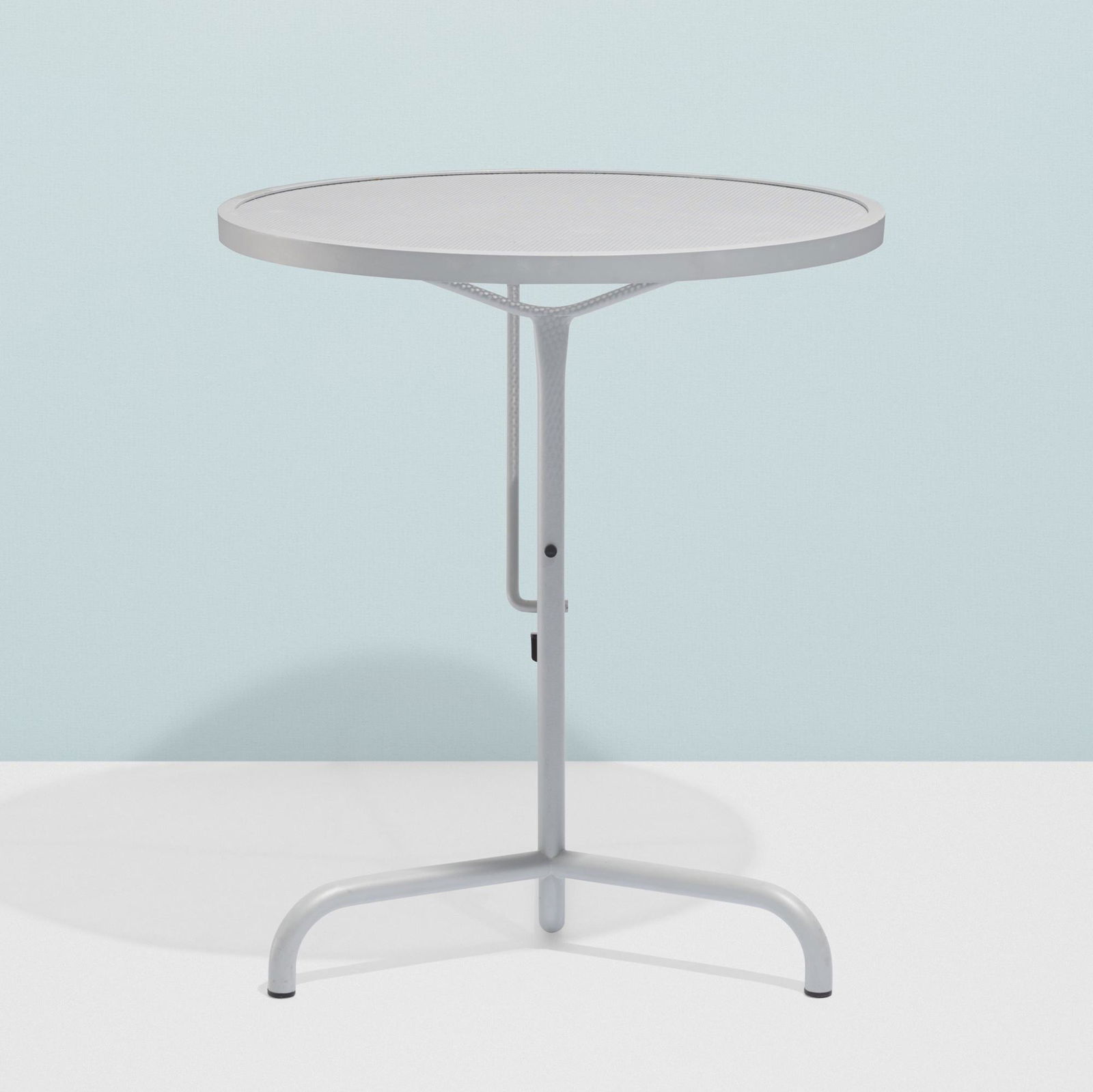 Konstantin Grcic, Satellite folding table: Konstantin Grcic Satellite folding table CappelliniItaly c. 1991perforated and enameled steel27 h × 23.5 w in (69 × 60 cm) Grcic designed the Satellite table as a graduation project