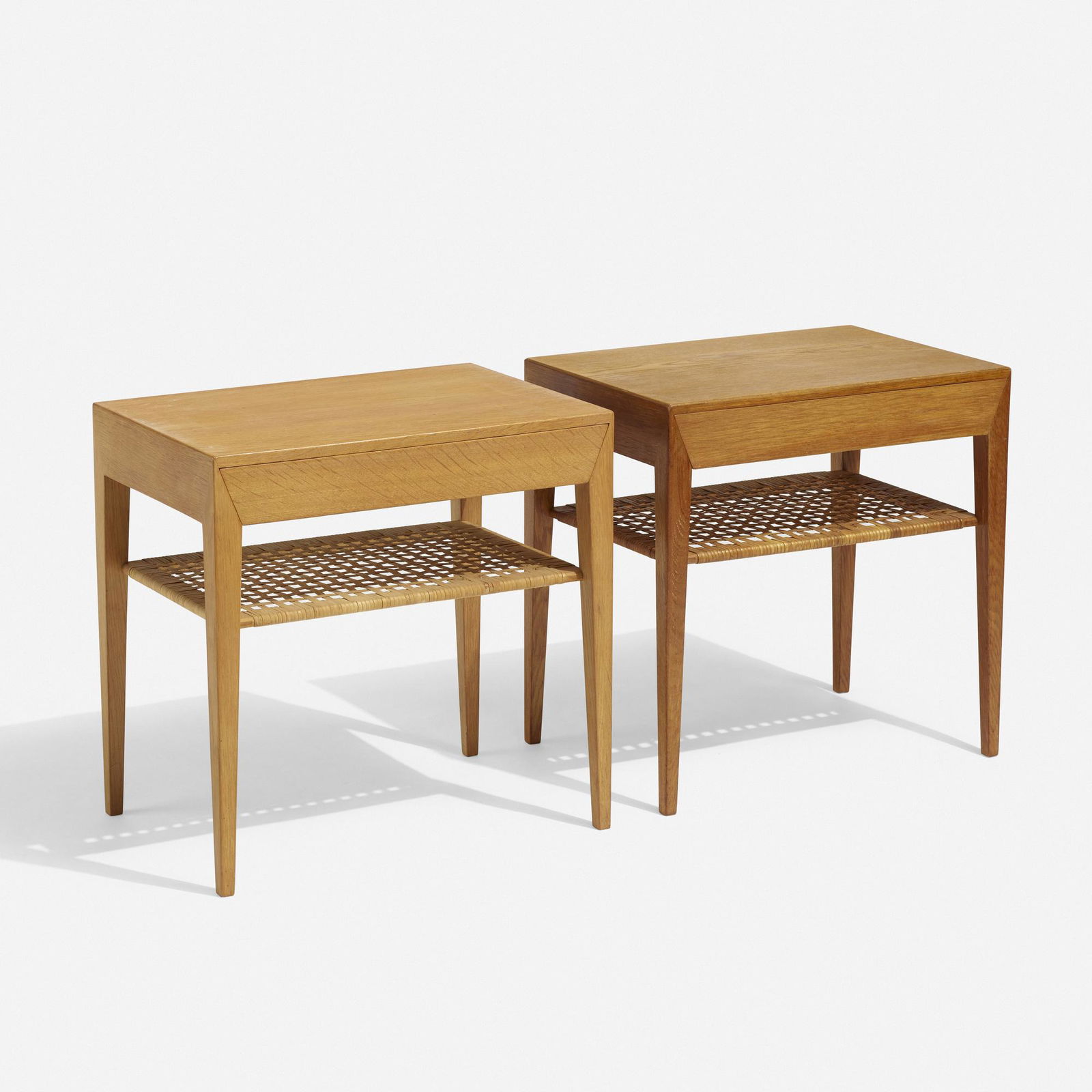 Severin Hansen Jr., nightstands, pair: Severin Hansen Jr. nightstands, pair Haslev Mobelsnedkeri A/SDenmark, c. 1965oak, cane19.5 w × 13.5 d × 19.75 h in (50 × 34 × 50 cm) Each example features a single drawer. Applied manufactu