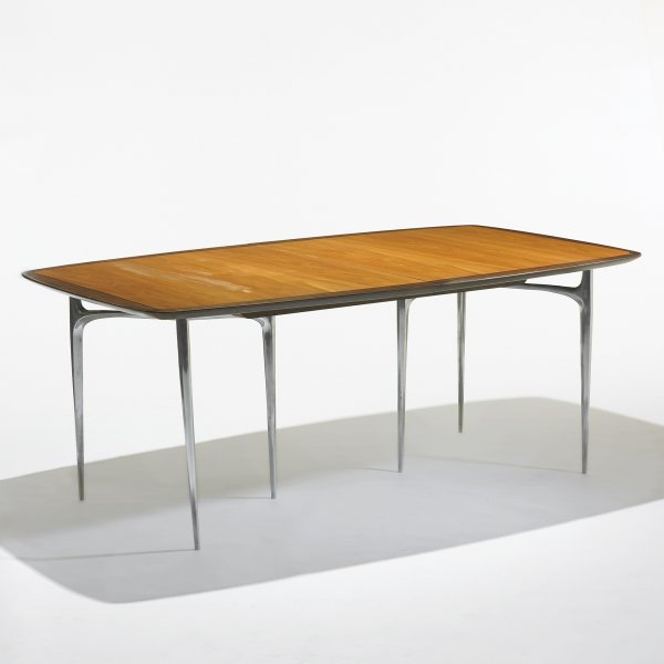 Donald Deskey dining table: Donald Deskey dining table Charak Modern USA , c. 1960 birch, walnut, aluminum, rosewood 72 w x 44 d x 29 h inches Sold with two 18-inch leaves; table measures 108 inches when fully extended. Signed w