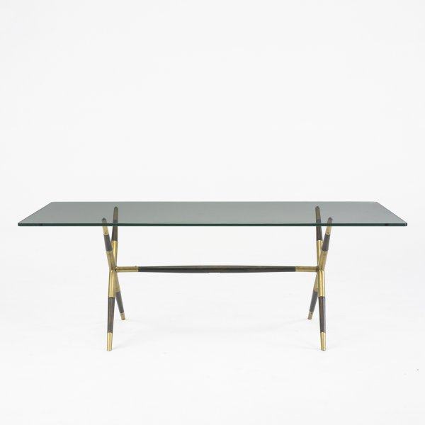 In the manner of Ico Parisi coffee table: In the manner of Ico Parisi coffee table Italy, c. 1955 glass, Italian walnut, brass 48 w x 28 d x 17.5 h inches