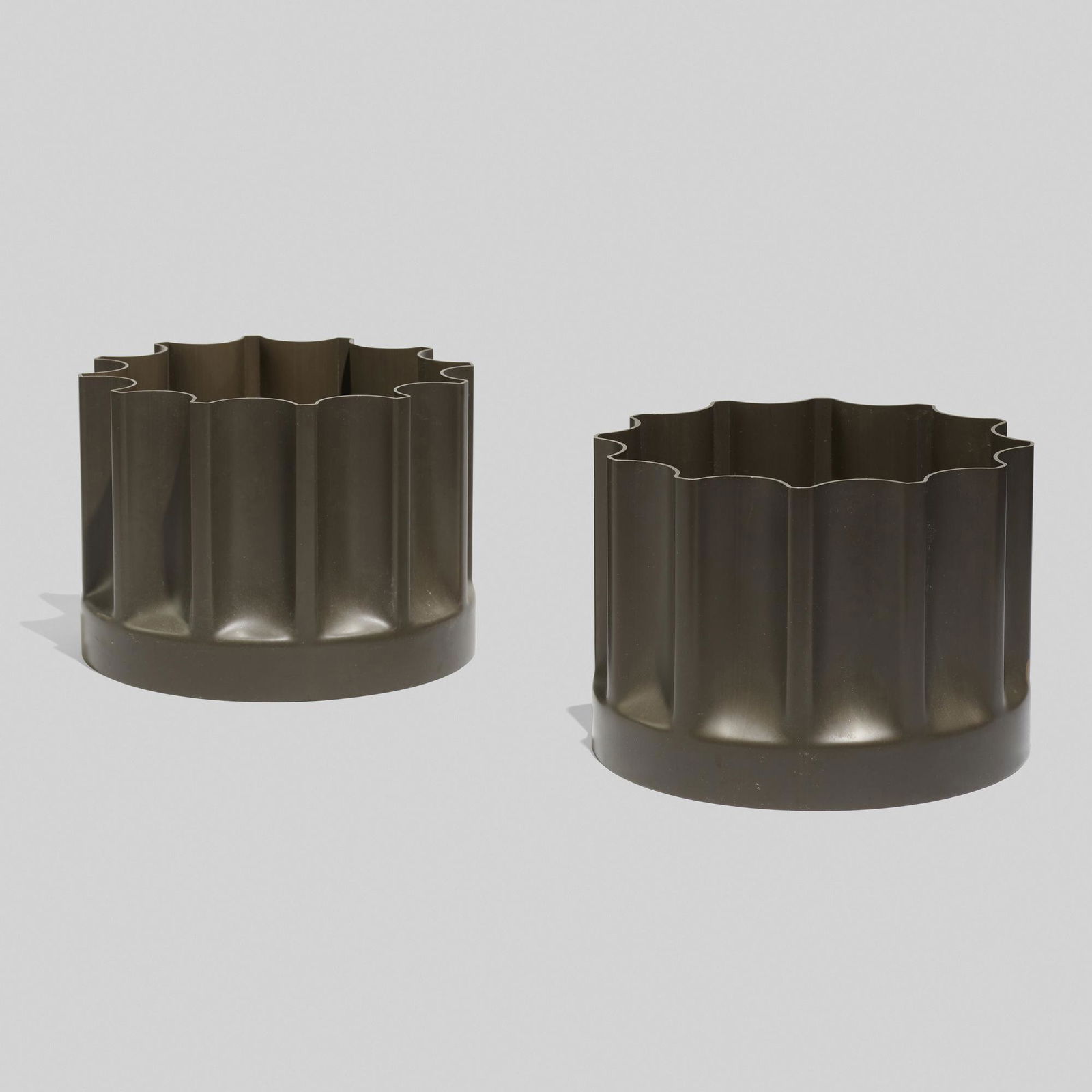 Enzo Mari, Rocco plant stands, model 3082B: Enzo Mari Rocco plant stands, model 3082B DaneseItaly, 1969PVC7 h × 9.75 dia in (18 × 25 cm) Metal disc manufacturer's label to underside of each example 'Enzo Mari 1969 Danese