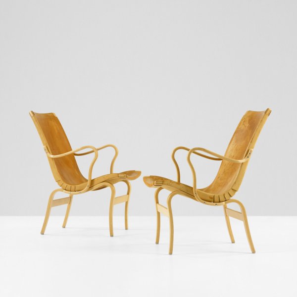 Bruno Mathsson Eva chairs, pair: Bruno Mathsson Eva chairs, pair DUX Sweden, c. 1933/1978 beech plywood, leather 32.5 w x 27 d x 33 h inches Signed with branded manufacturer’s mark to stretcher of each example: [Bruno Mathsson