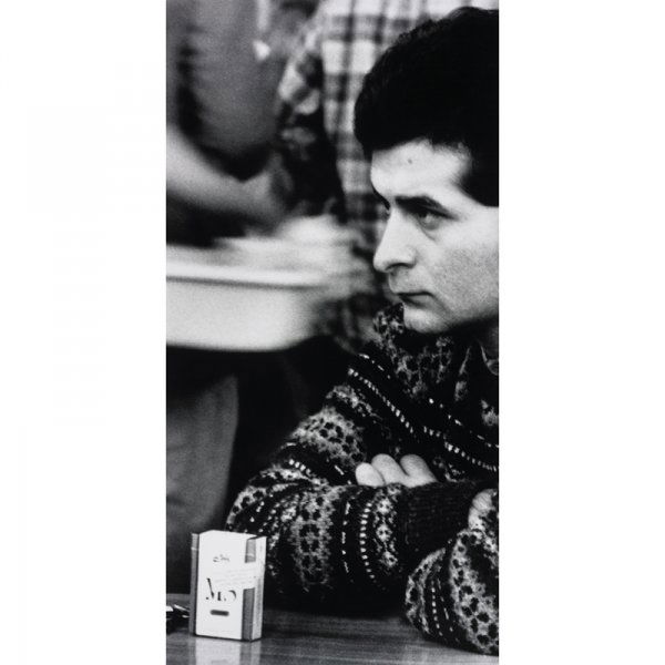 Sam Samore Situation: Sam Samore Situation (Man with Cigarette Pack on Table) USA, 1980-1989 gelatin silver print 71.75 h x 35.75 w inches This work is from the edition of 2.