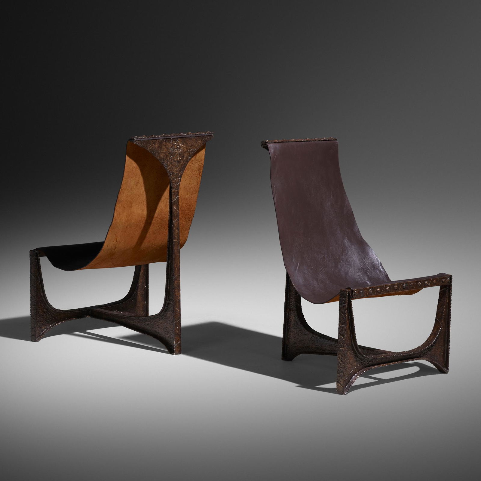 Paul Evans, Sling chairs, pair: Paul Evans Sling chairs, pair Paul Evans StudioUSA, c. 1965welded and enameled steel, leather28 w × 27 d × 40.5 h in (71 × 69 × 103 cm) Provenance: