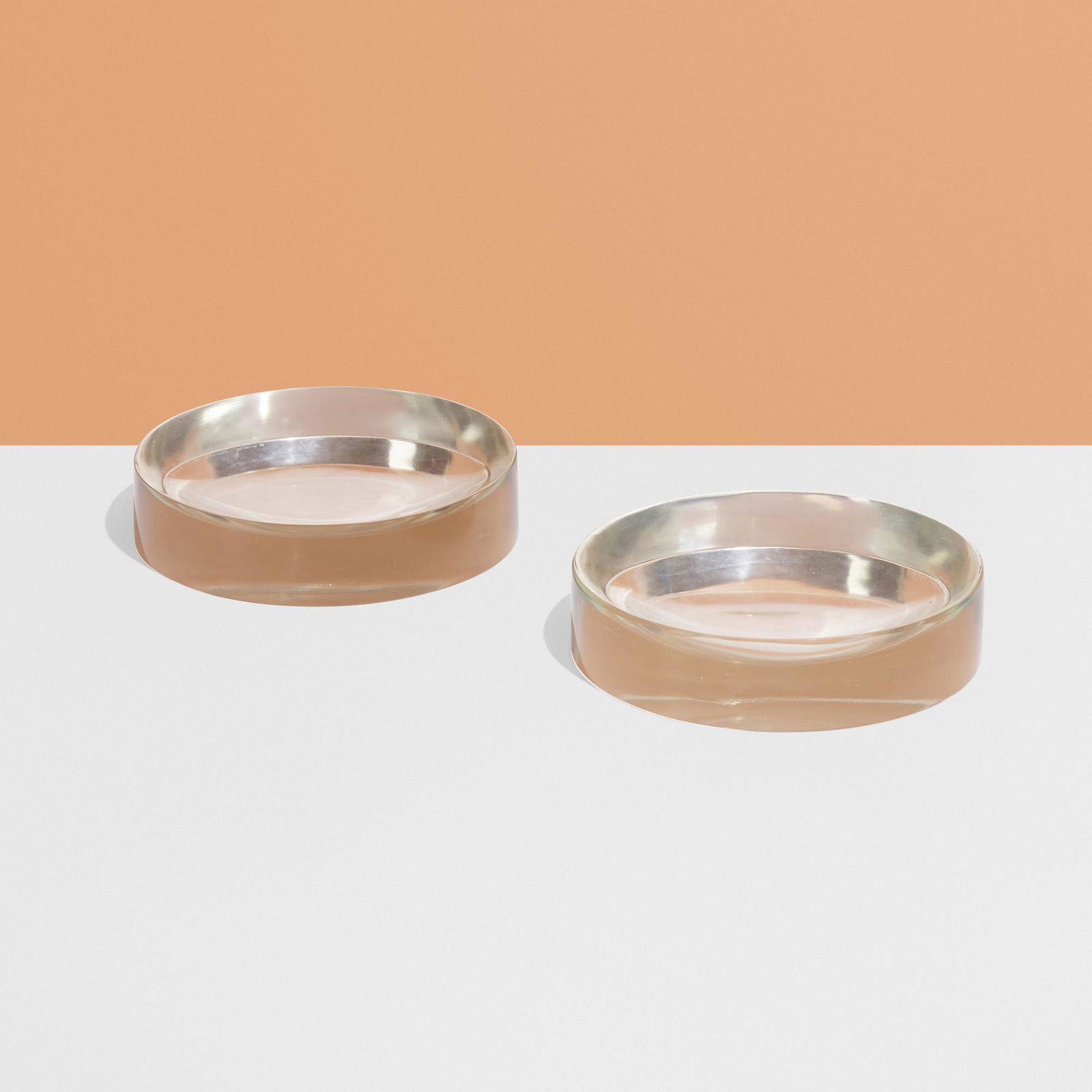 Ward Bennett, Bowls, pair: Ward Bennett Bowls, pair Brickel Associatesc. 1975glass 1.75 h × 7.75 dia in (4 × 20 cm) Incised signature to underside of each example 'Ward Bennett Designs'.