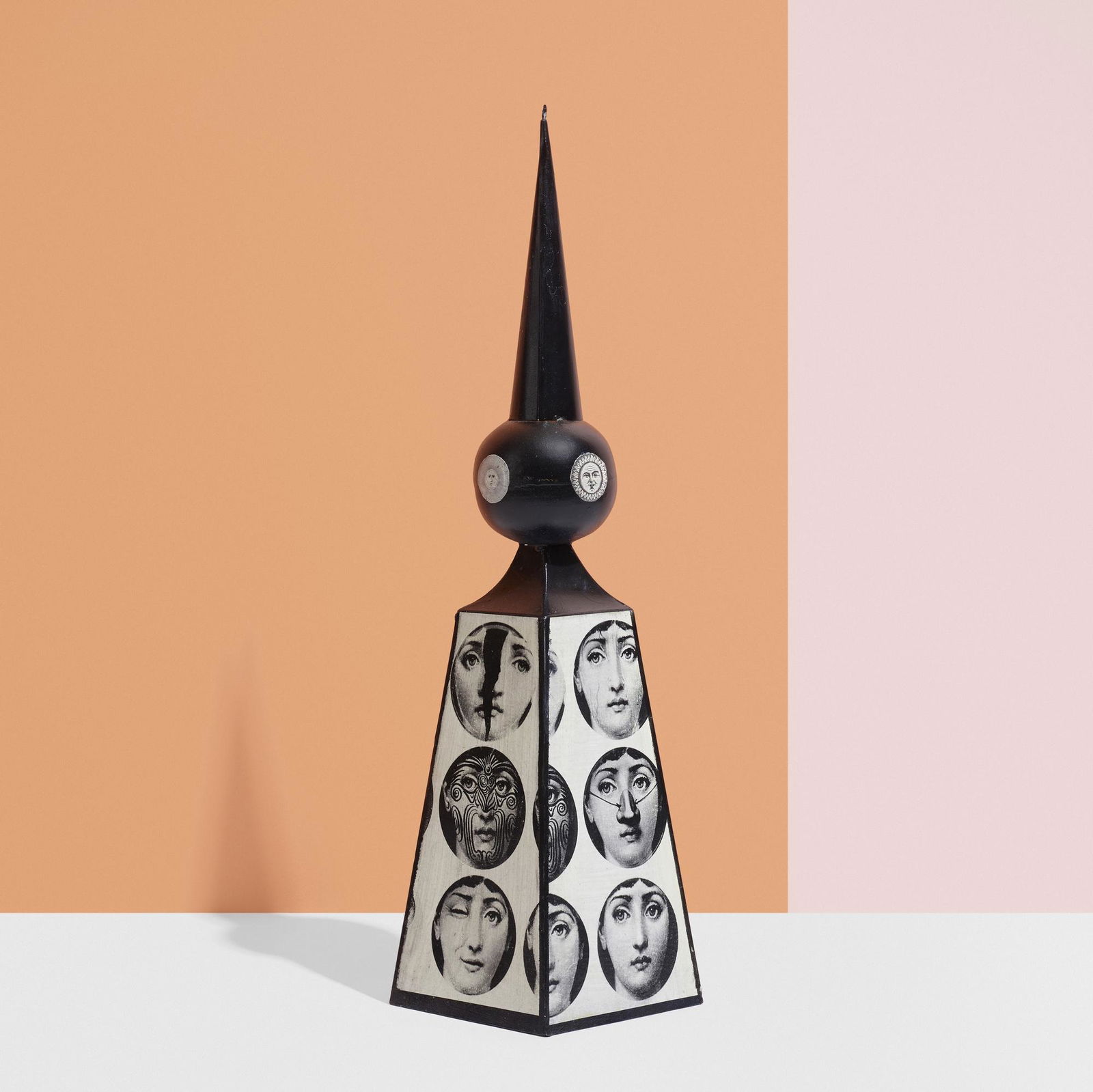 In the manner of Piero Fornasetti, Obelisk: In the manner of Piero Fornasetti Obelisk c. 1955transfer print on enameled steel 28.75 h × 7 w × 7 d in (73 × 18 × 18 cm) Provenance: Private Collecti