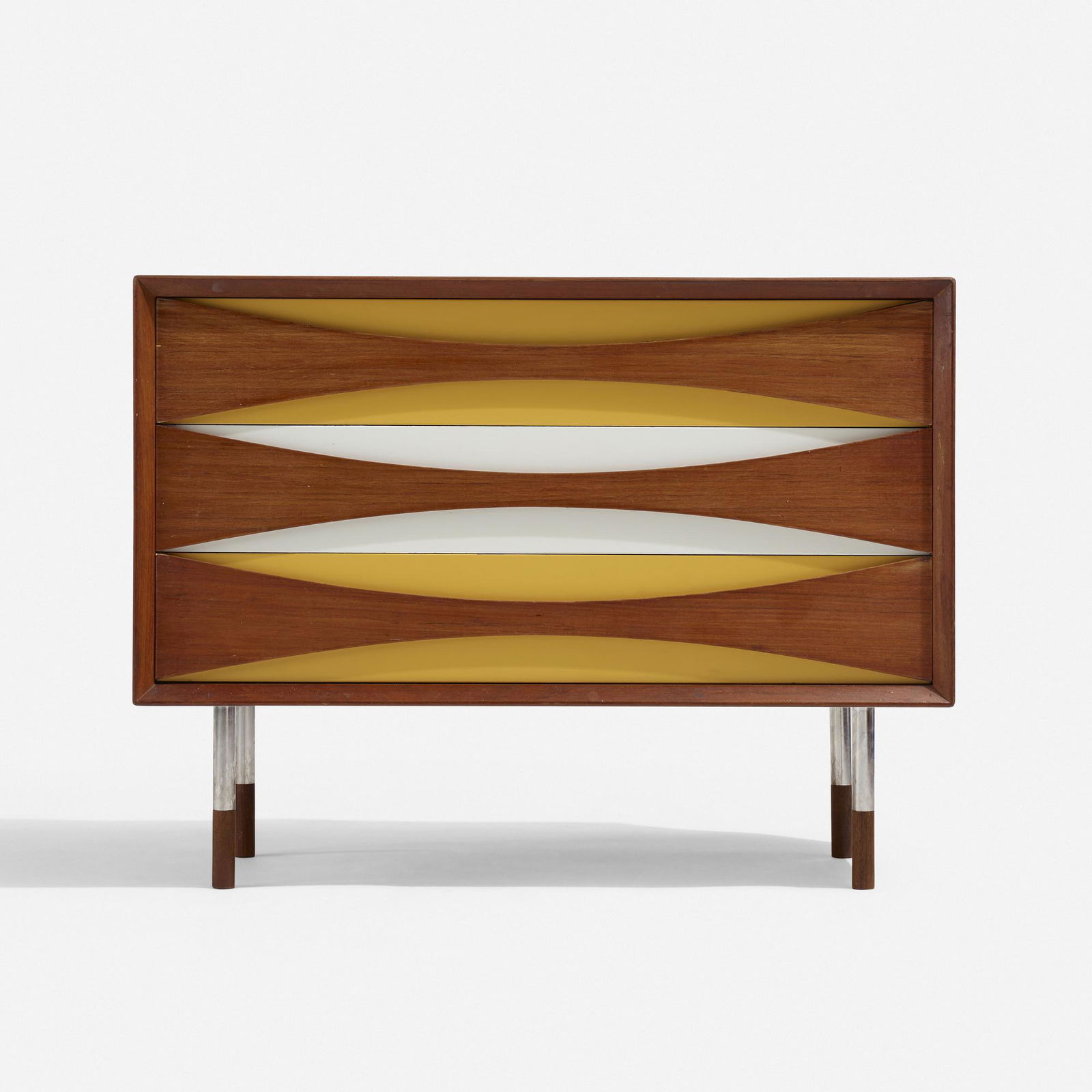Arne Vodder, Cabinet: Arne Vodder Cabinet Sibast MoblerDenmark, c. 1960teak, lacquered wood, stainless steel 27 h × 35.5 w × 16 d in (69 × 90 × 41 cm) Cabinet features three drawers.