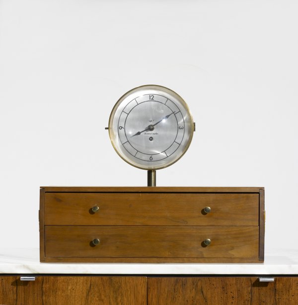 George Nelson & Associates clock with jewelry box: George Nelson & Associates clock with jewelry box Howard Miller Clock Company USA, c. 1965 walnut, brass, Plexiglas, aluminum, enameled steel 19 w x 8.5 d x 14.75 h inches Signed with manufacturer's m