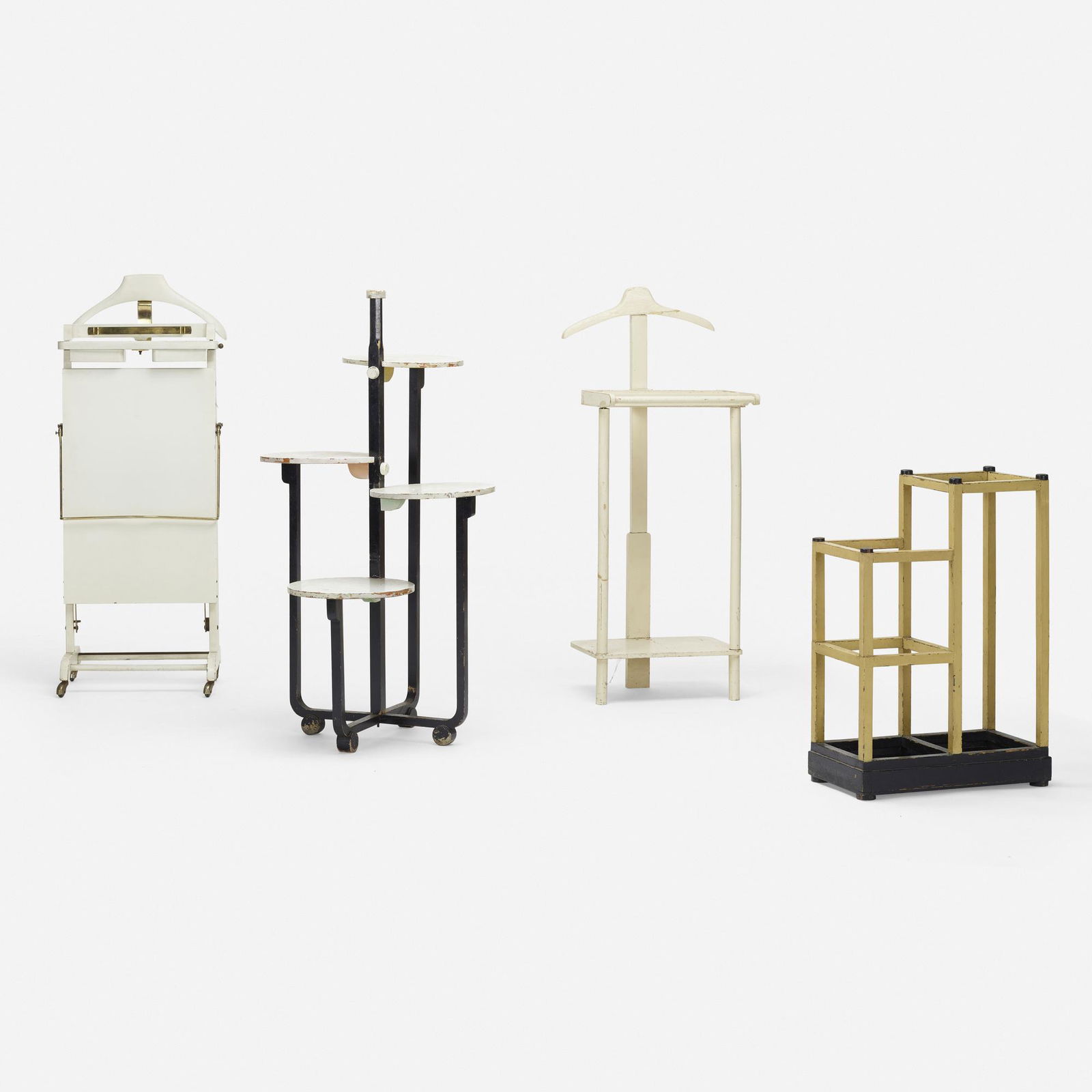 Andre Groult, Collection of four silent butlers: In the manner of Andre Groult Collection of four silent butlers c. 1925lacquered wood, nickel-plated steel, enameled steel largest: 42.5 h × 23.5 w × 23 d in (108 × 60 × 58 cm