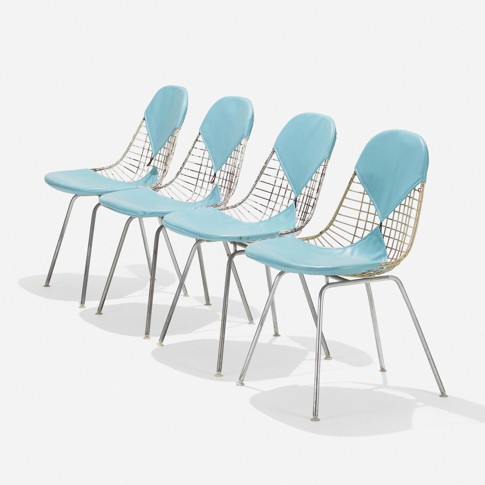 Charles and Ray Eames, DKX-2s, set of four: Charles and Ray Eames DKX-2s, set of four Herman Miller USA, 1951 enameled steel, zinc-plated steel, leather 32.5 h × 19 w × 22 d in (83 × 48 × 56 cm) Liter