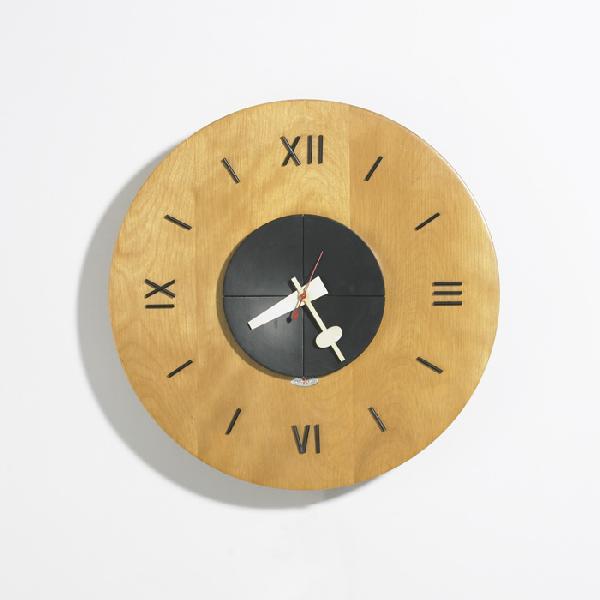 George Nelson & Associates wall clock, model 4758: George Nelson & Associates wall clock, model 4758 Howard Miller Clock Company USA, c. 1948 birch, lacquered wood, enameled aluminum 14 dia x 3.25 h inches Signed with decal manufacturer's label to rev