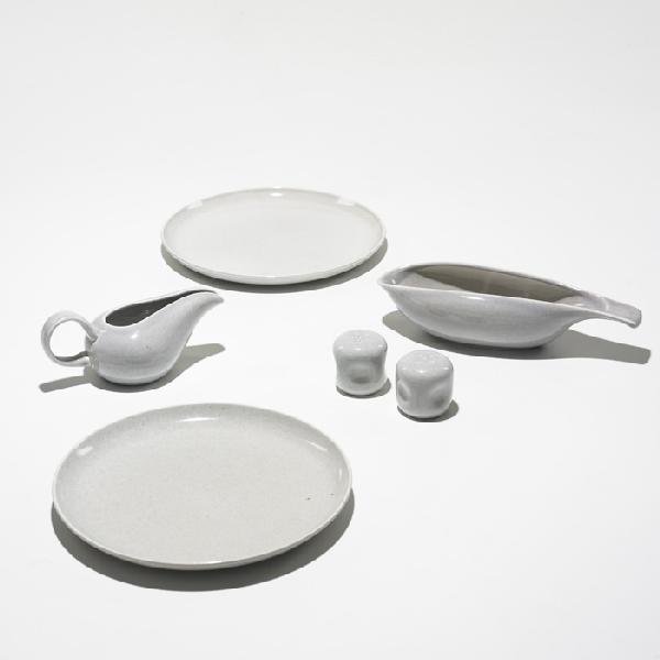 Russel Wright dishware: Russel Wright dishware Steubenville USA , 1939 glazed stoneware 10 dia x 1 h inches Signed with impressed manufacturer's mark to underside of three examples: [Russel Wright Mfg. By Steubenville]. Lite