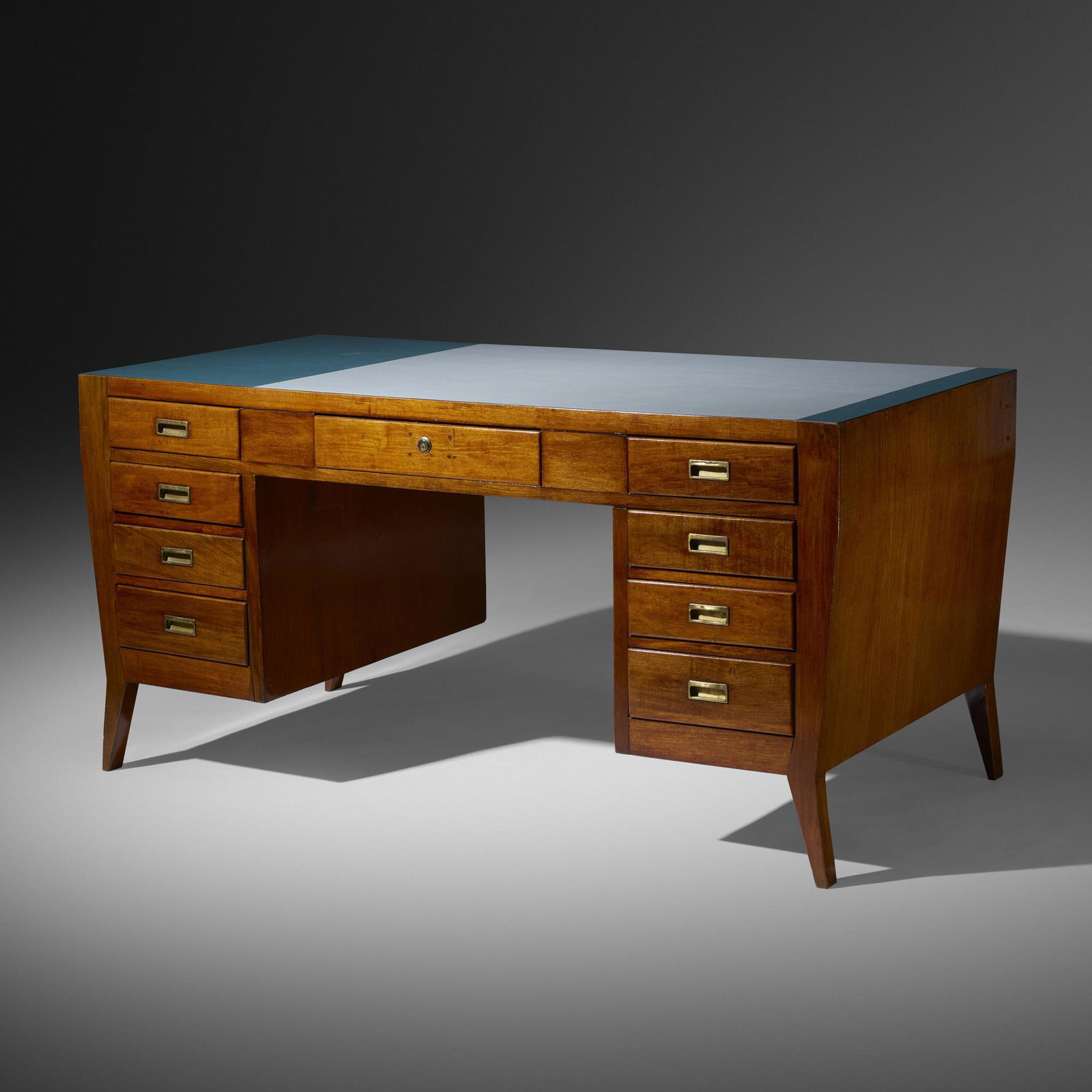 Gio Ponti, Desk: Gio Ponti Desk Giordano ChiesaItaly, c. 1950Italian walnut, laminate, brass 31 h × 62.75 w × 31.75 d in (79 × 159 × 81 cm) This desk features nine drawers, one of