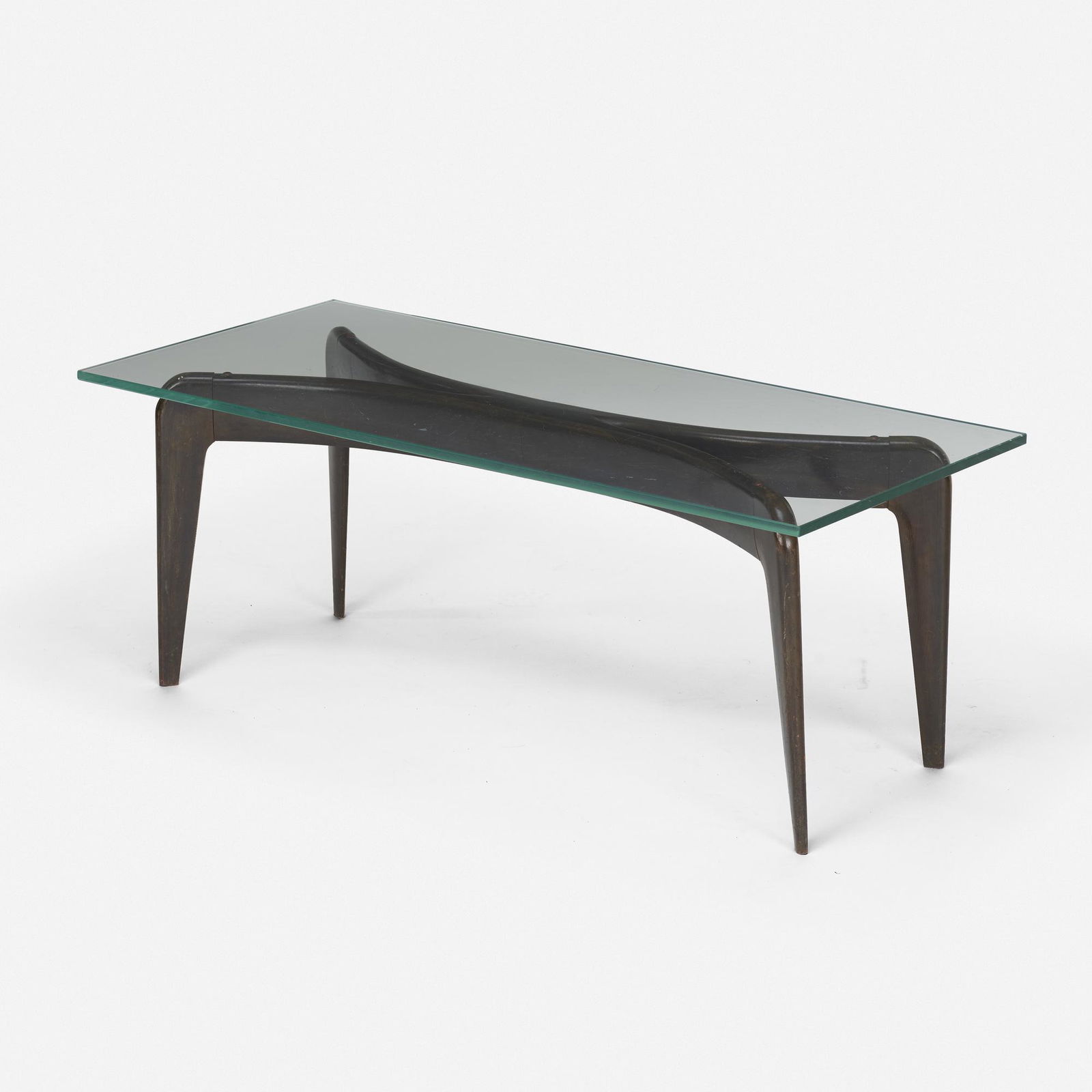 Gio Ponti, Coffee table: Gio Ponti Coffee table Fontana ArteItaly, c. 1936 / c. 1956ebonized wood, glass 16.25 h × 42.25 w × 18.25 d in (41 × 107 × 46 cm) Provenance: Cam
