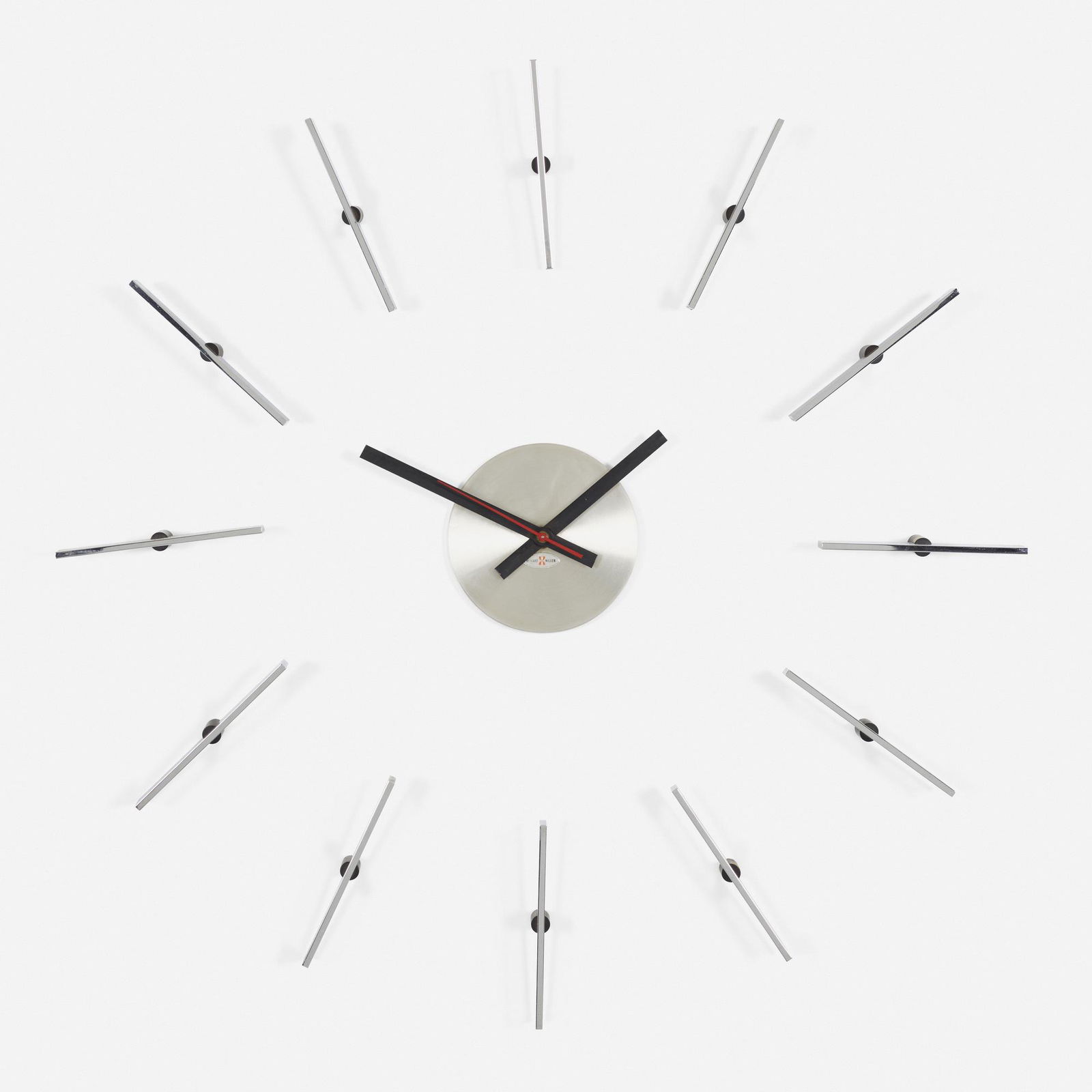 George Nelson & Associates, Wall clock, model 6774: George Nelson & Associates Wall clock, model 6774 Howard Miller Clock CompanyUSA, c. 1960chrome-plated brass, enameled brass, enameled aluminum 1.25 d × 25.5 dia in (3 × 65 cm) <