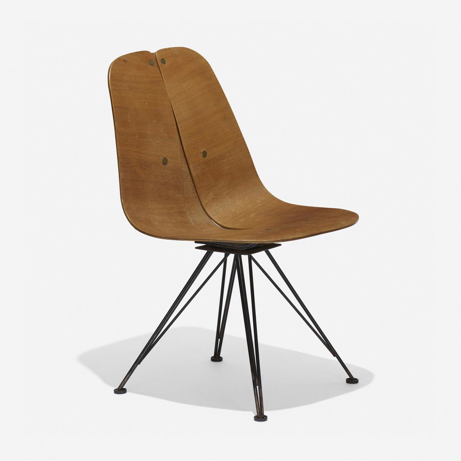 Iver Bertelsen, Chair: Iver Bertelsen Chair Steelcraft Inc.USA, c. 1945walnut plywood, enameled steel, brass 31.25 h × 19.5 w × 21 d in (79 × 50 × 53 cm) Partial foil manufacturer's lab