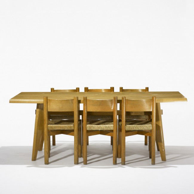 Perriand and Jeanneret Demountable table & chairs: Charlotte Perriand and Pierre Jeanneret Demountable dining table and set of six chairs France, 1940 oak, rush 79 w x 37.5 d x 28.25 h inches Chairs measure: 16 w x 18 d x 30 h inches. Literature: Char