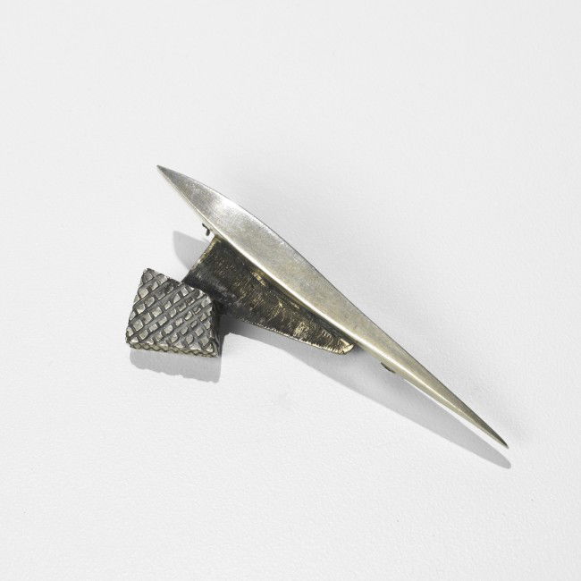 Margaret de Patta brooch: Margaret de Patta brooch USA, c. 1948 sterling silver 3 w x .5 d x 1.25 h inches Signed with impressed artist's mark and signature to reverse: [De Patta Sterling]. Literature: Structure and Ornament:
