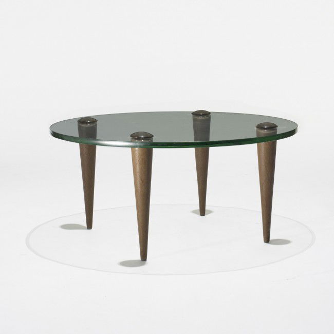 Gilbert Rohde Paldao coffee table, model 4127: Gilbert Rohde Paldao coffee table, model 4127 Herman Miller USA, 1940 glass, vinyl, lacquered wood 34 dia x 15.25 h inches Literature: Herman Miller 1940 Catalog & Supplement: Gilbert Rohde Modern Fur