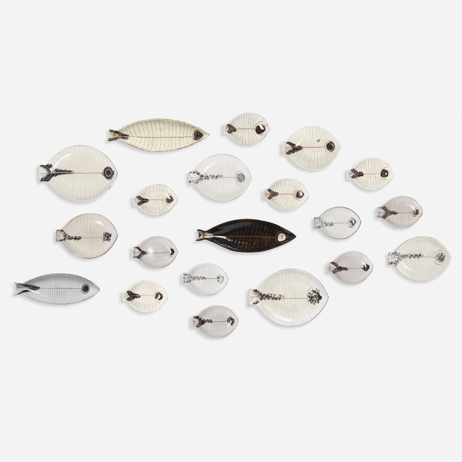 LaGardo Tackett and Kenji Fujita, Fish platters and plates: LaGardo Tackett and Kenji Fujita Collection of Fish platters and plates USA, c. 1950glazed and incised earthenware largest: 2 h × 19 w × 6.5 d in (5 × 48 × 17 cm) smallest: