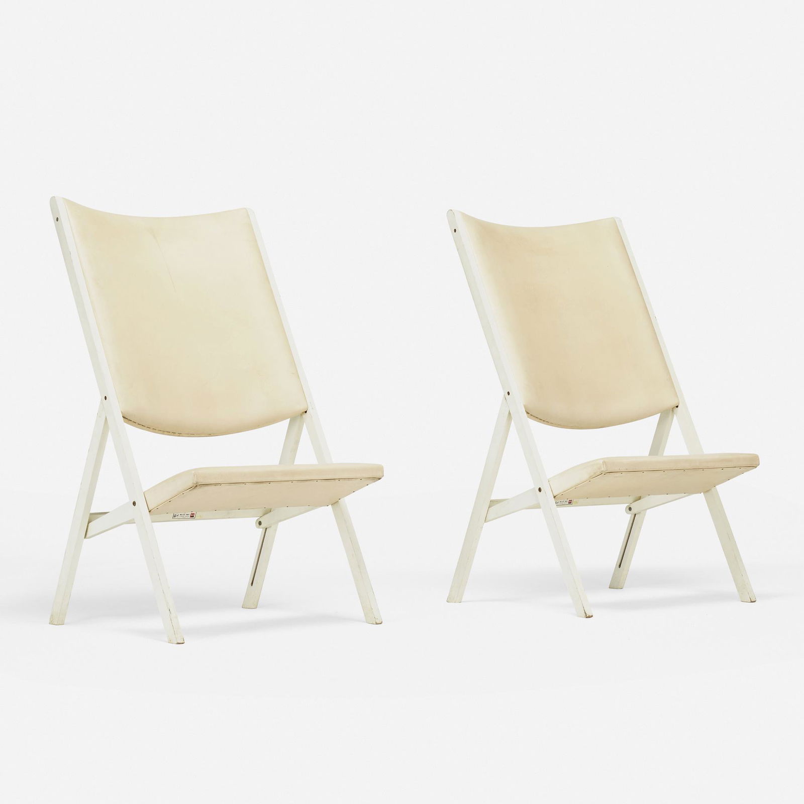Gio Ponti, Gabriela chairs, pair: Gio Ponti Gabriela chairs, pair Walter PontiItaly, c. 1970lacquered wood, leather 41.5 h × 23.5 w × 25 d in (105 × 60 × 63 cm) Decal manufacturer's label to under
