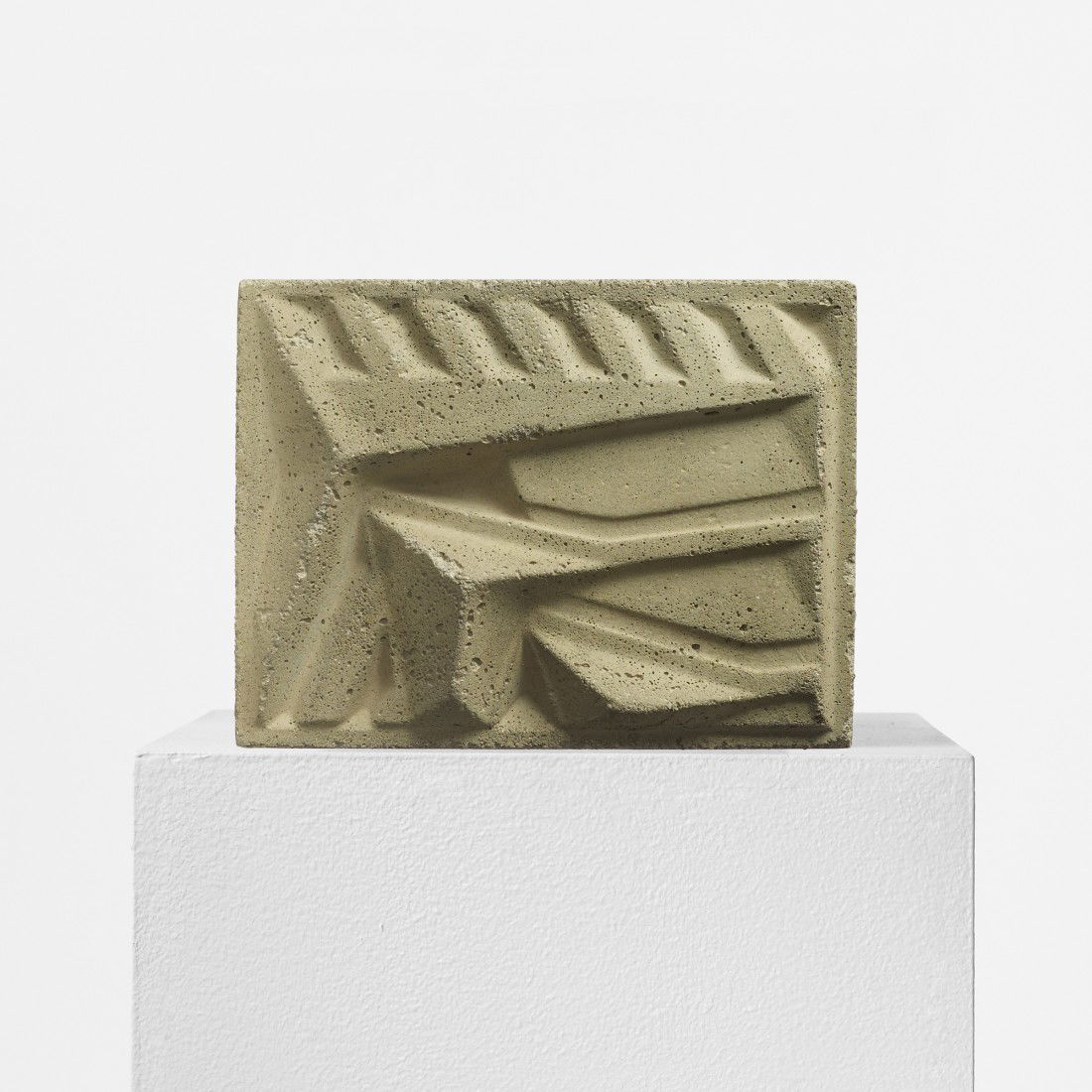 Frank Lloyd Wright brick from Arizona Biltmore: Frank Lloyd Wright brick from Arizona Biltmore USA, 1927 cast concrete 7 w x 4 d x 9 h inches Literature: Frank Lloyd Wright Monograph: 1924-1936, Futagawa, ppg. 40-45 Provenance: Arizona Biltmore, Ph