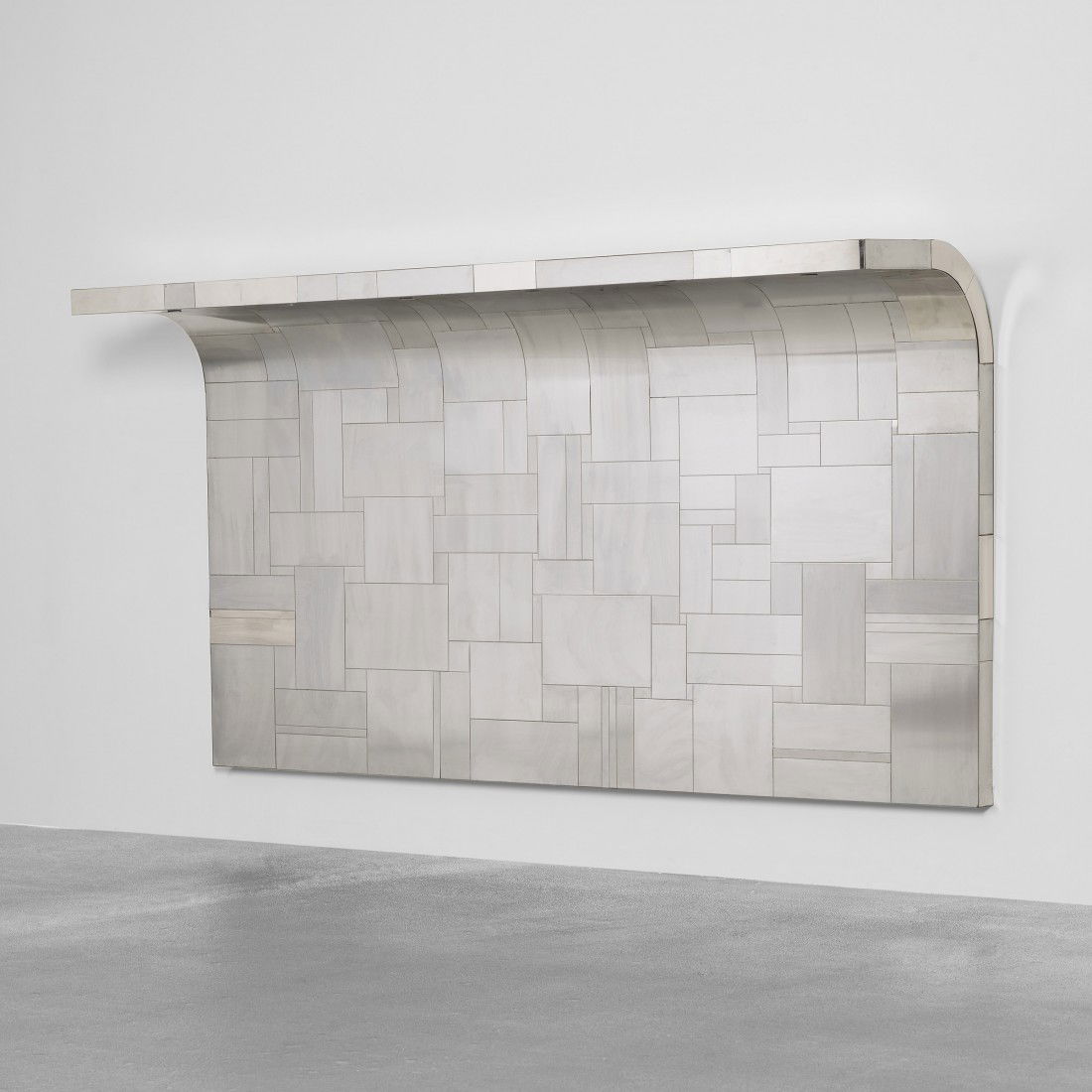 Paul Evans Cityscape Headboard: Paul Evans Cityscape Headboard Paul Evans Studio for Directional USA, c. 1975 chrome-plated steel 82 w x 19 d x 52.25 h inches Headboard features six electrical outlets along the interior edge.